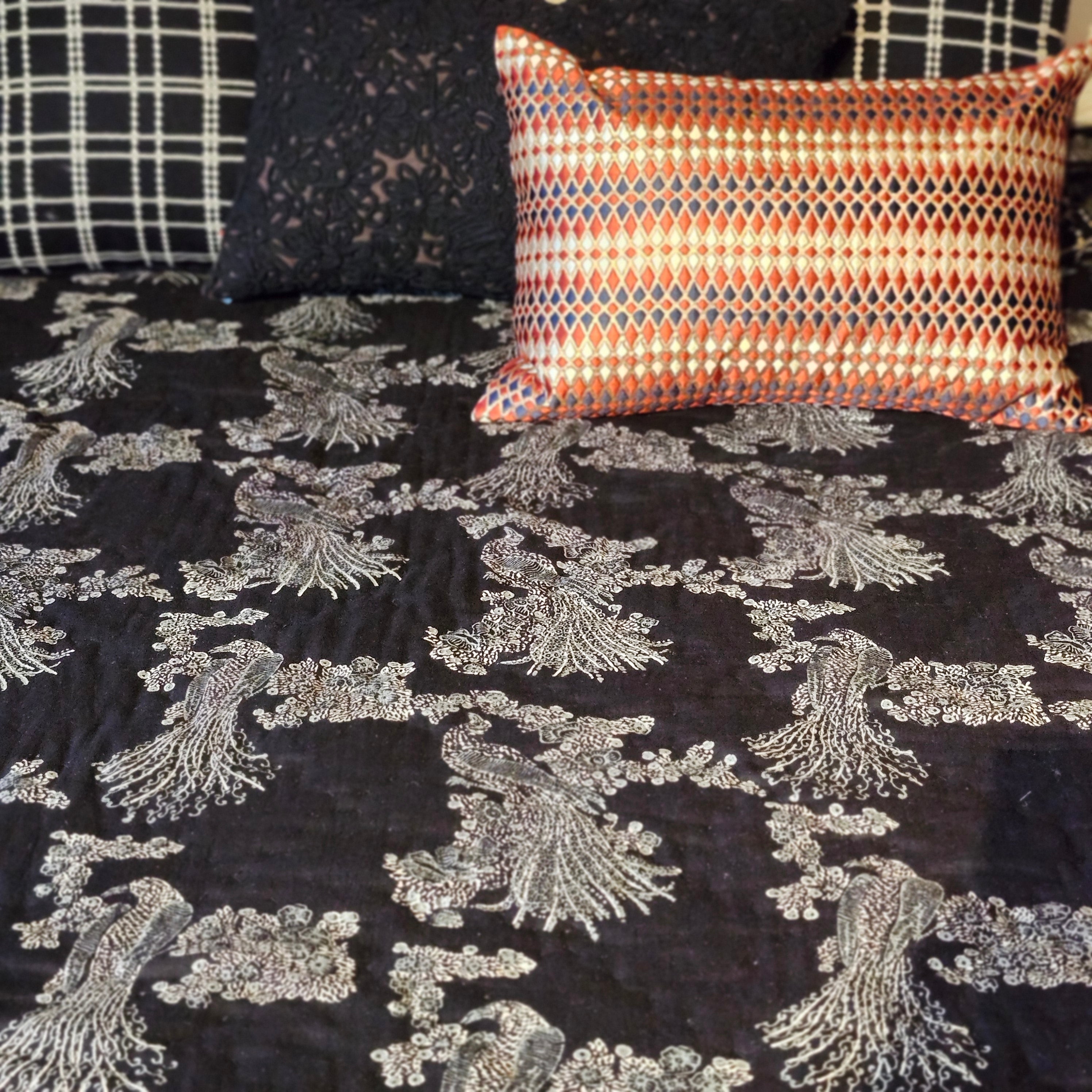 Birds of Paradise block-print quilt, silver birds on black cotton voile