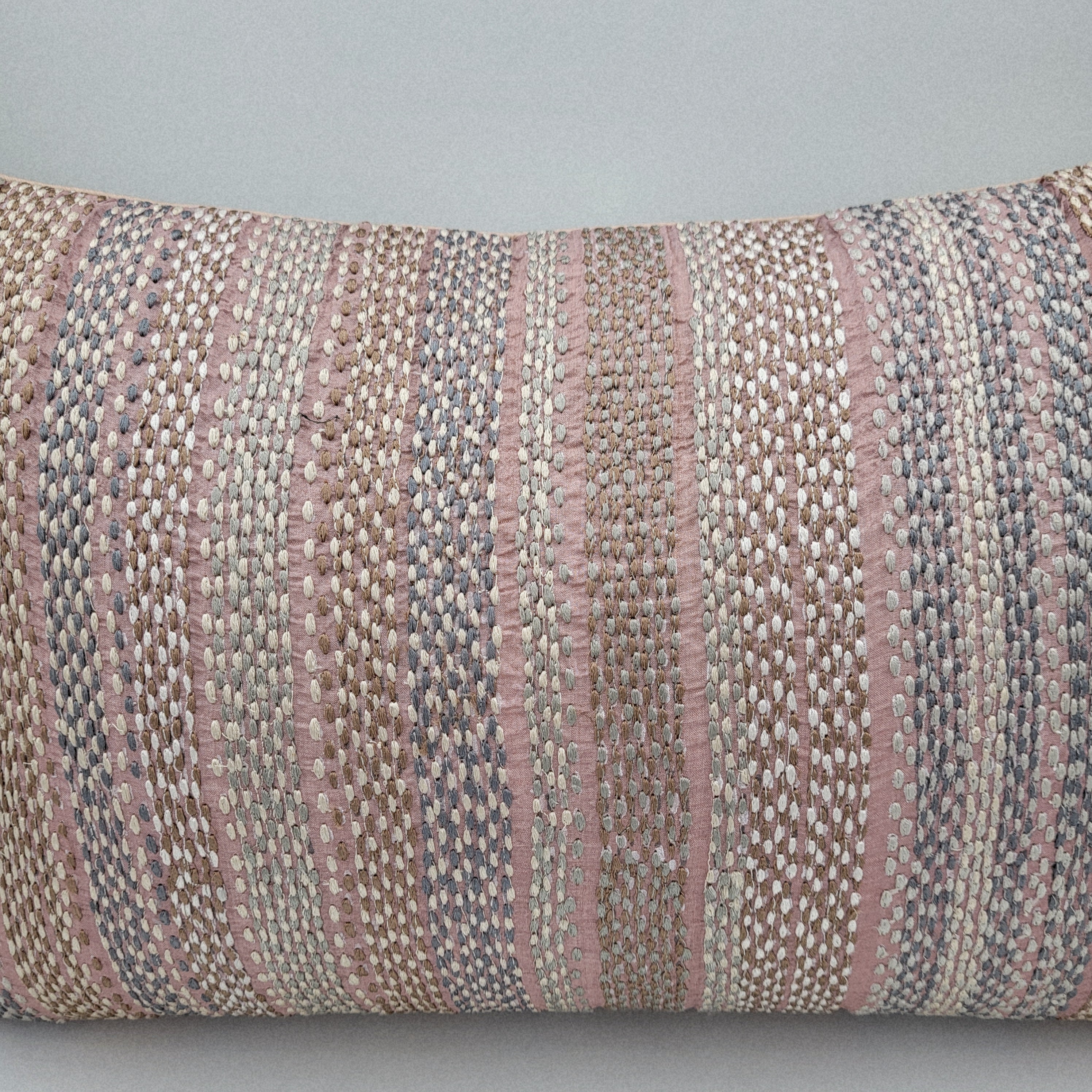 Shell pink striped embroidered cushion by Rasa Jaipur, 30 x 46 cm, styled view
