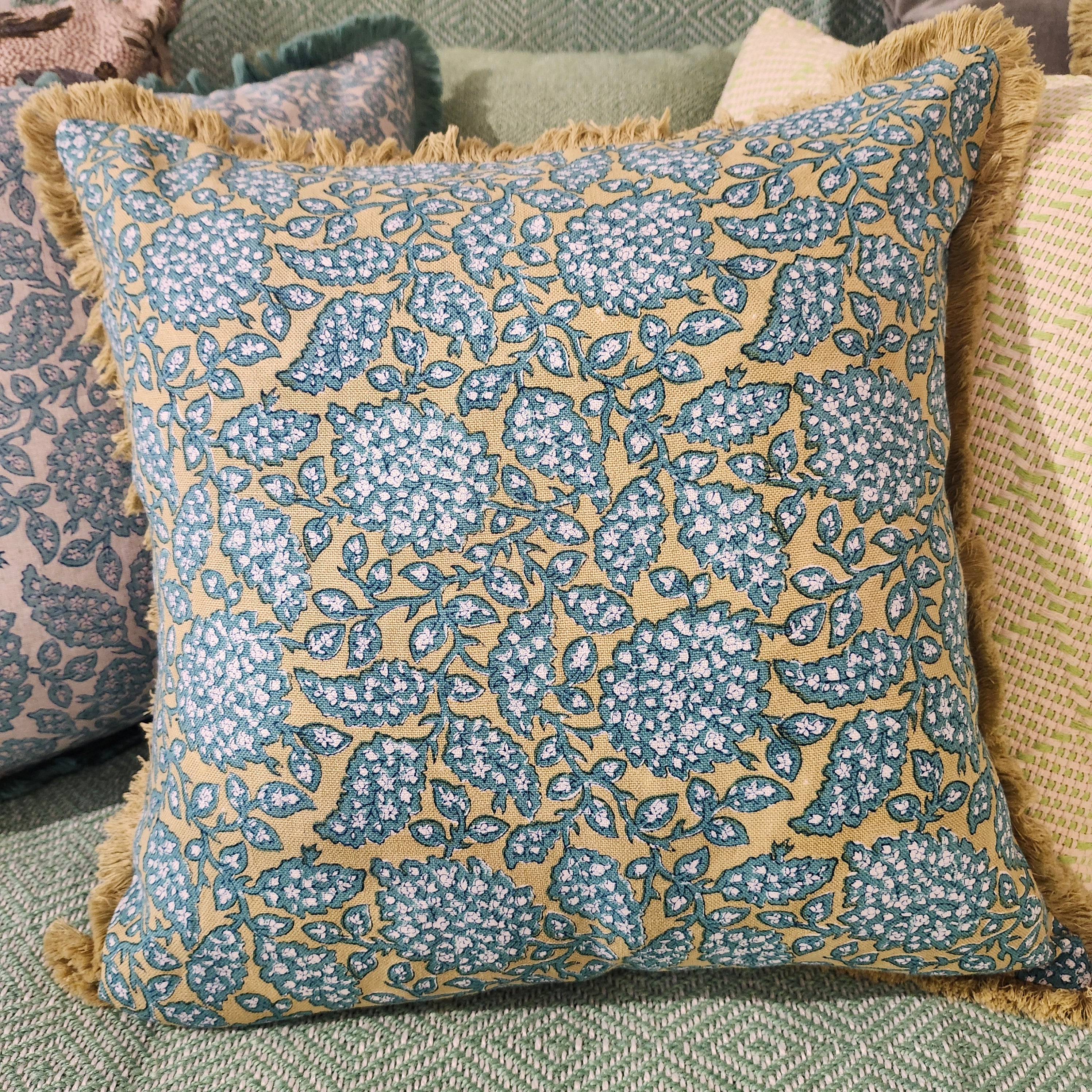 Shahnaz green block-print linen cushion with fringe