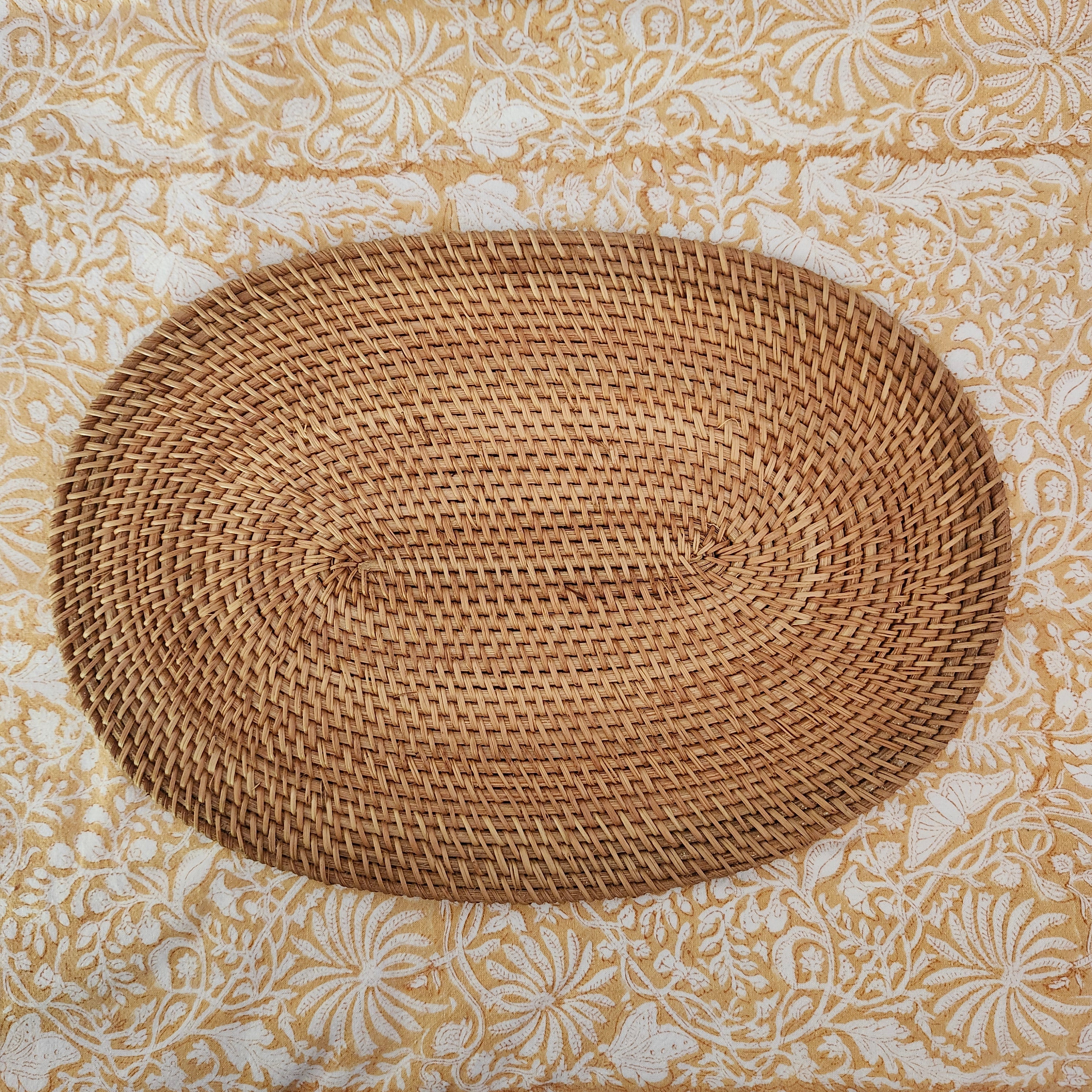 Oval rattan placemat, small, 25 x 35 cm, handwoven
