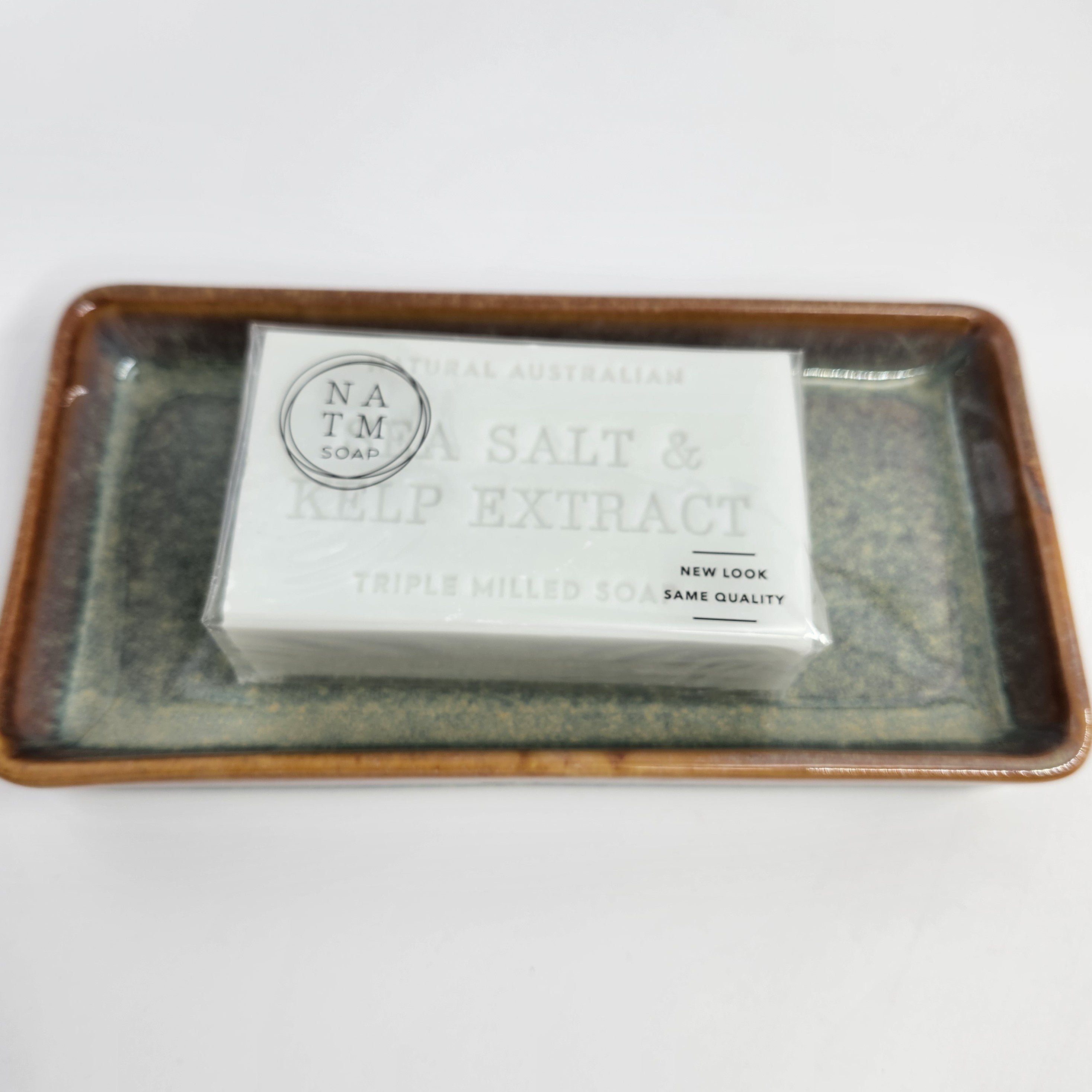 Jade ceramic dish, rounded corners, polished glaze, styled