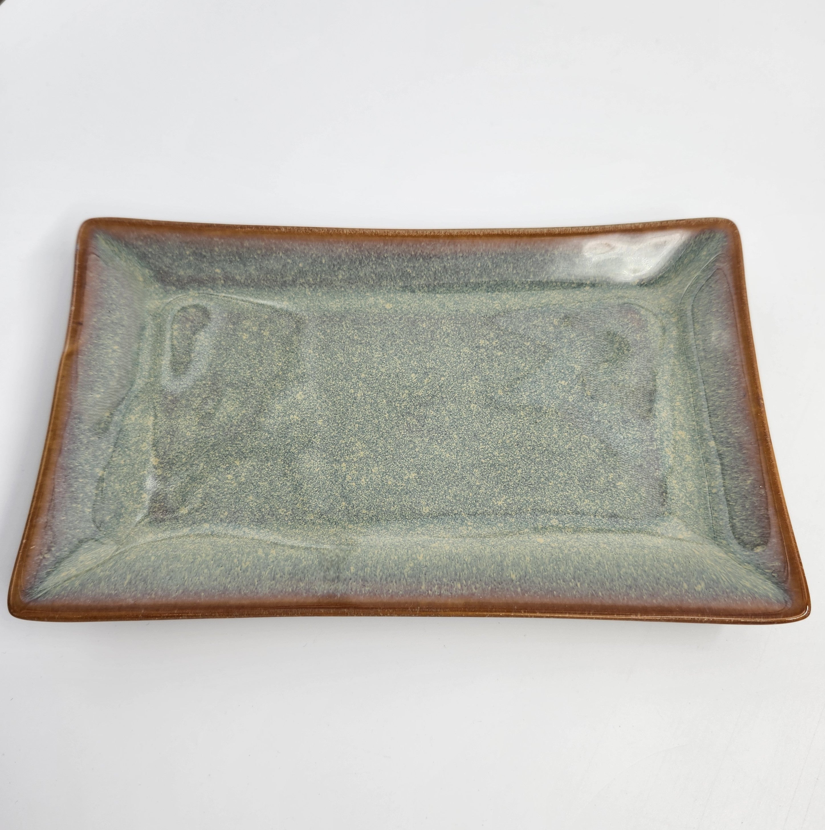 Rectangular ceramic dish in jade with polished glaze, 19 x 11.2 cm