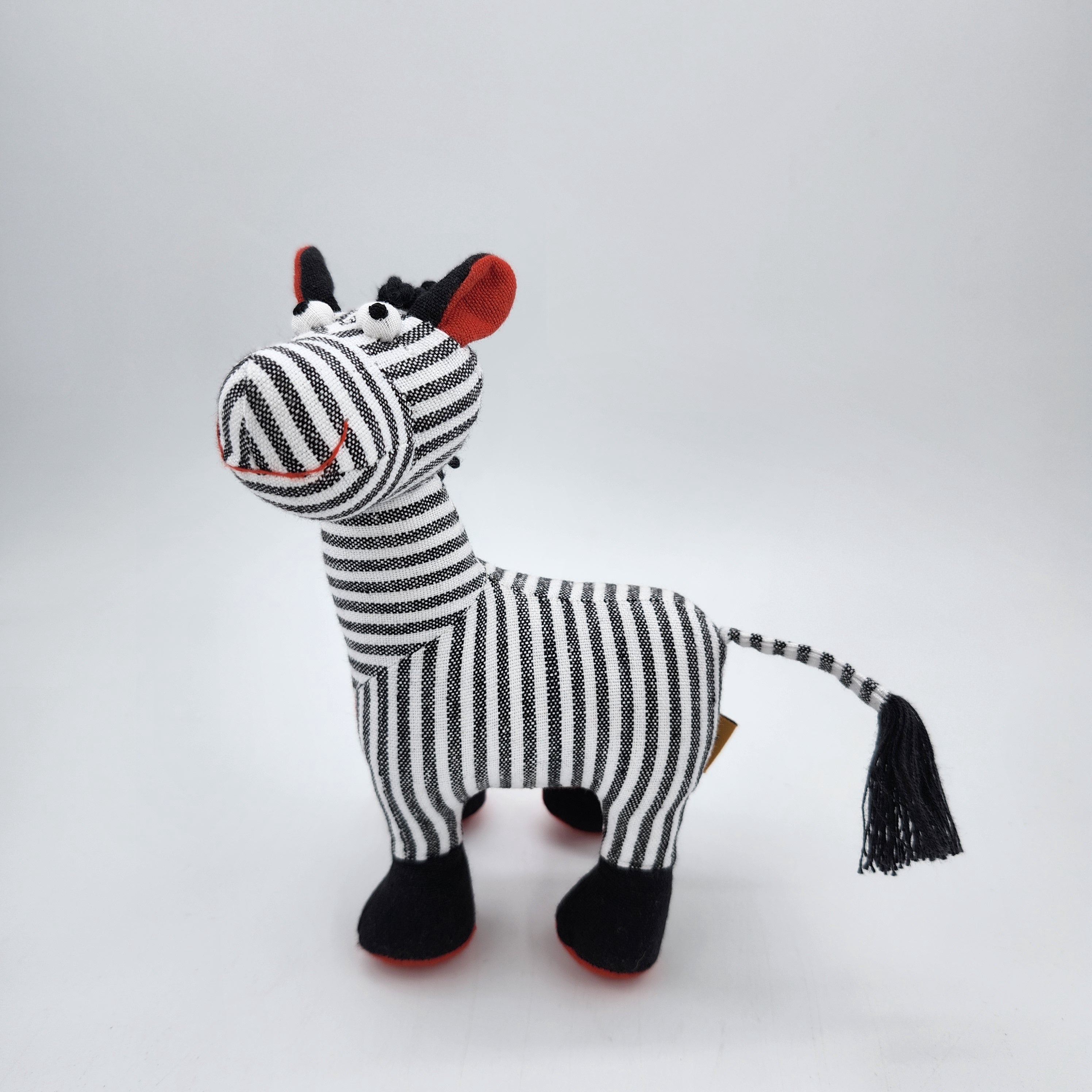 Ziggy the Zebra cotton soft toy, handwoven, side view