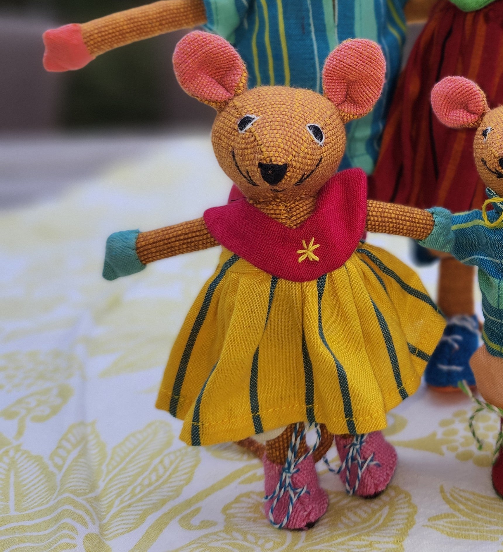 Handwoven fabric mouse, small girl in colourful clothes, Sri Lanka
