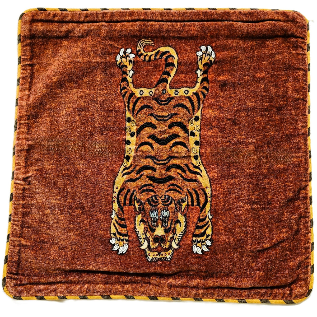 Printed cotton velvet cushion cover with a traditional tiger figure embellished with beads, 45 by 45cm.