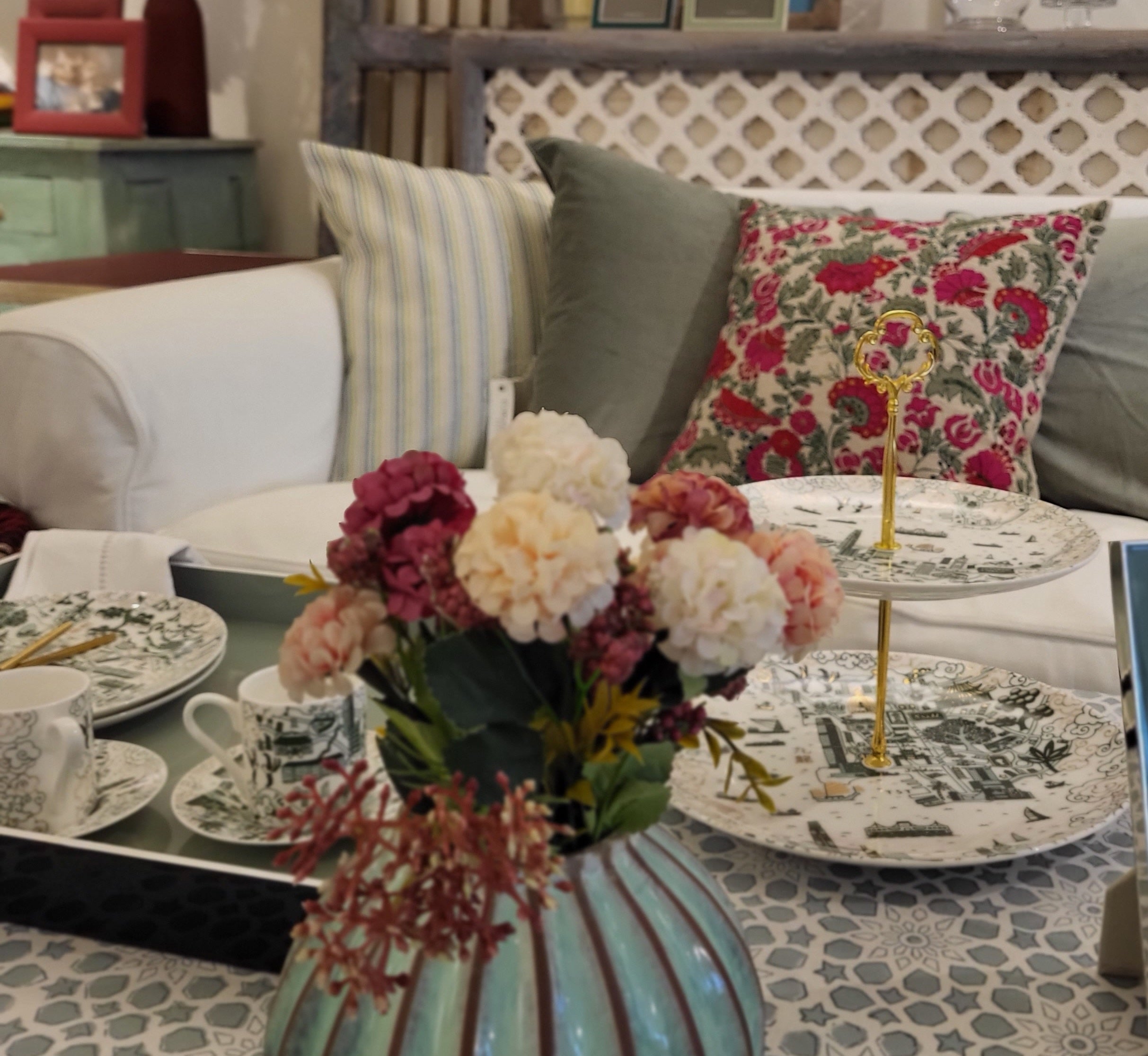 Suzani Bright Flower linen cushion, floral embroidery detail