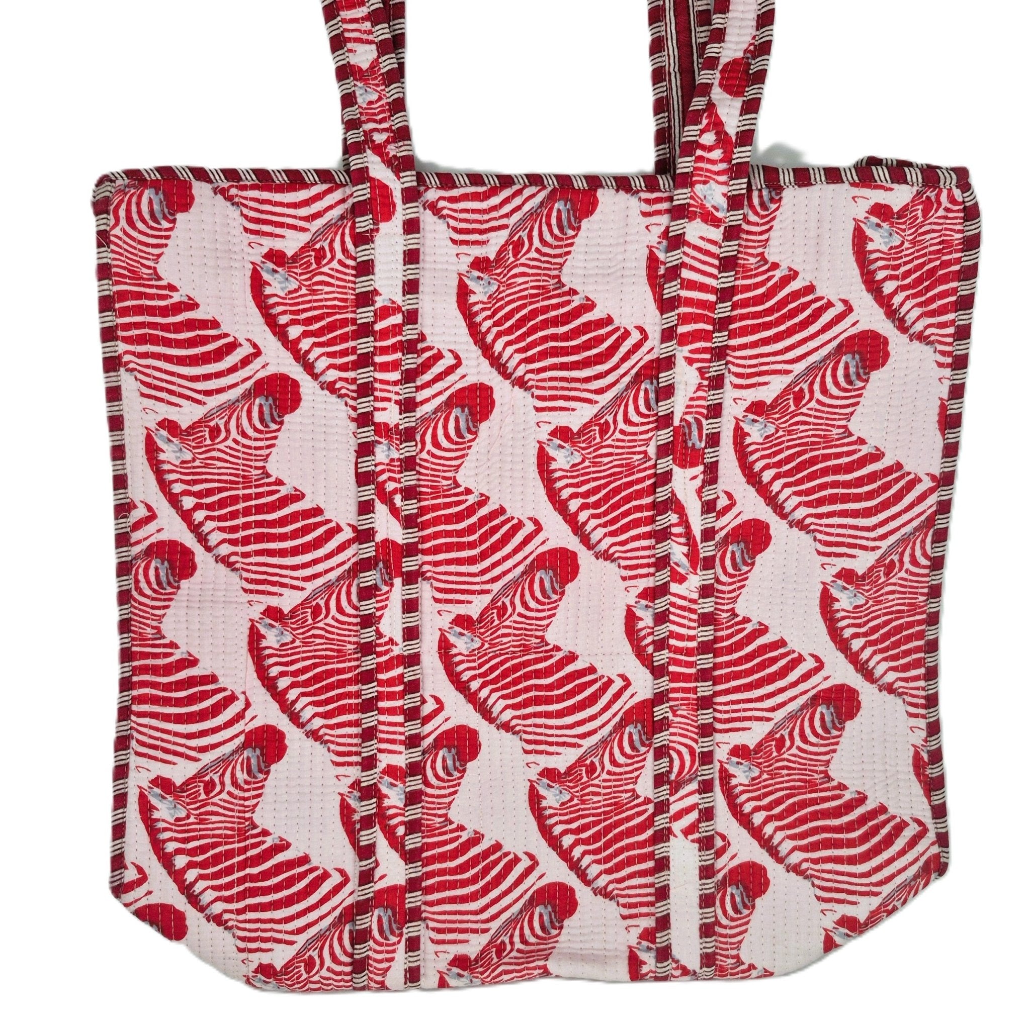 Zebra block-print quilted cotton shopper bag with red zebras on white, contrast lining and zip closure