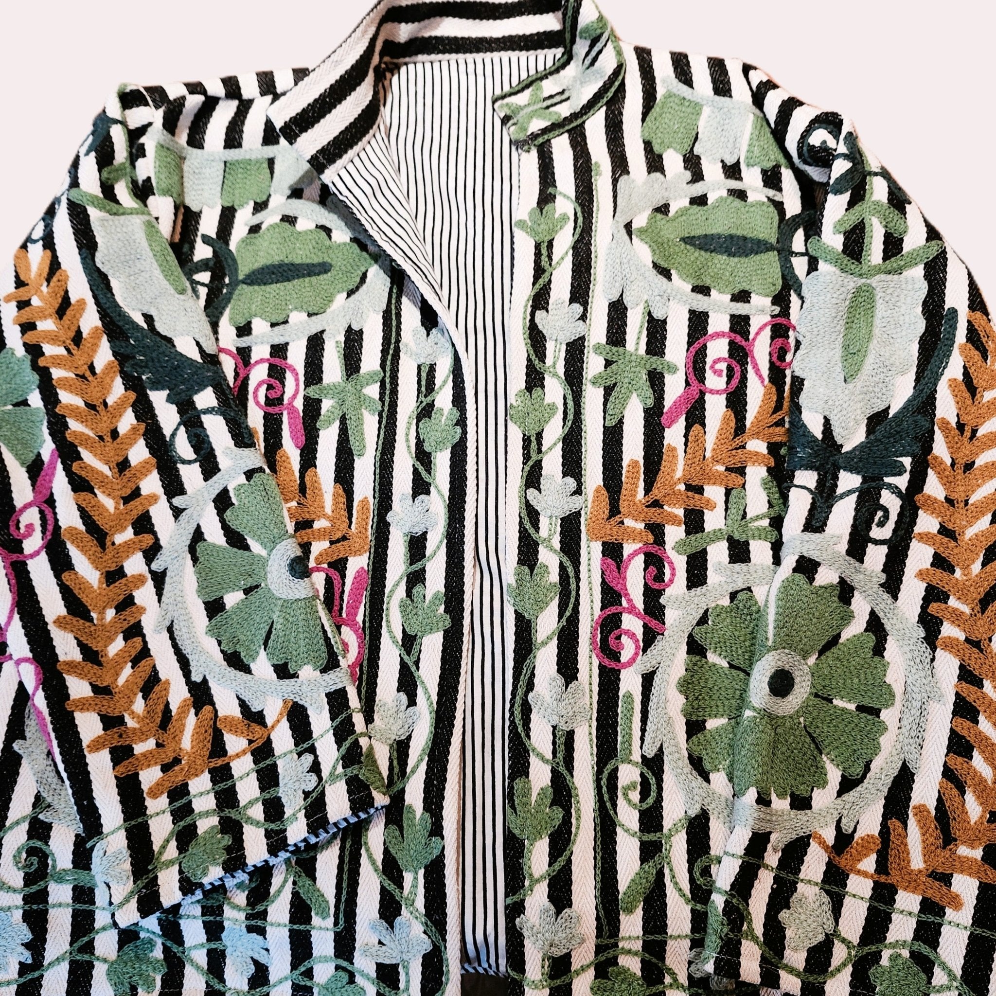 Striped suzani jacket, black and white with green suzani stitching, back view
