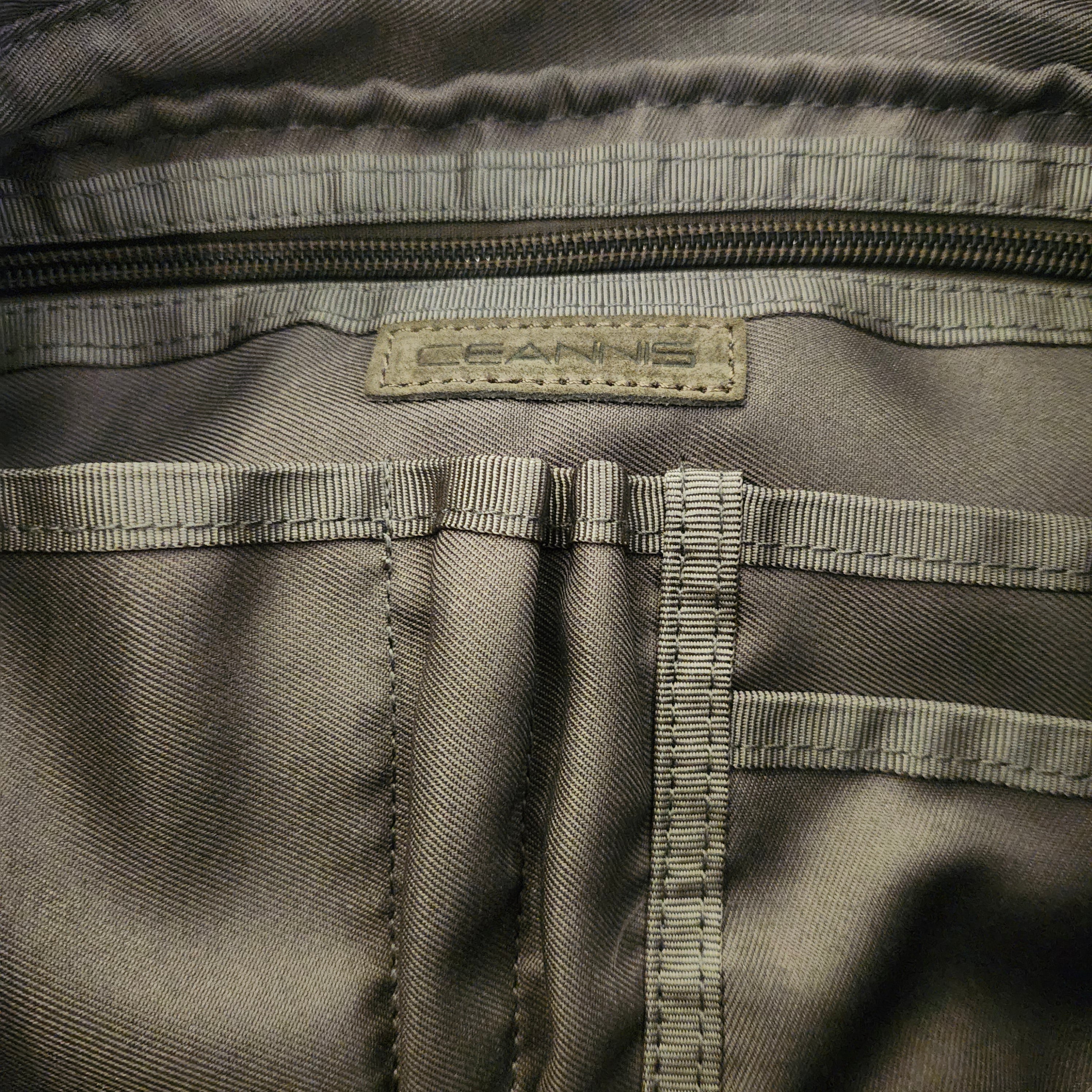 Ceannis taupe suede bag, detail of outer pockets