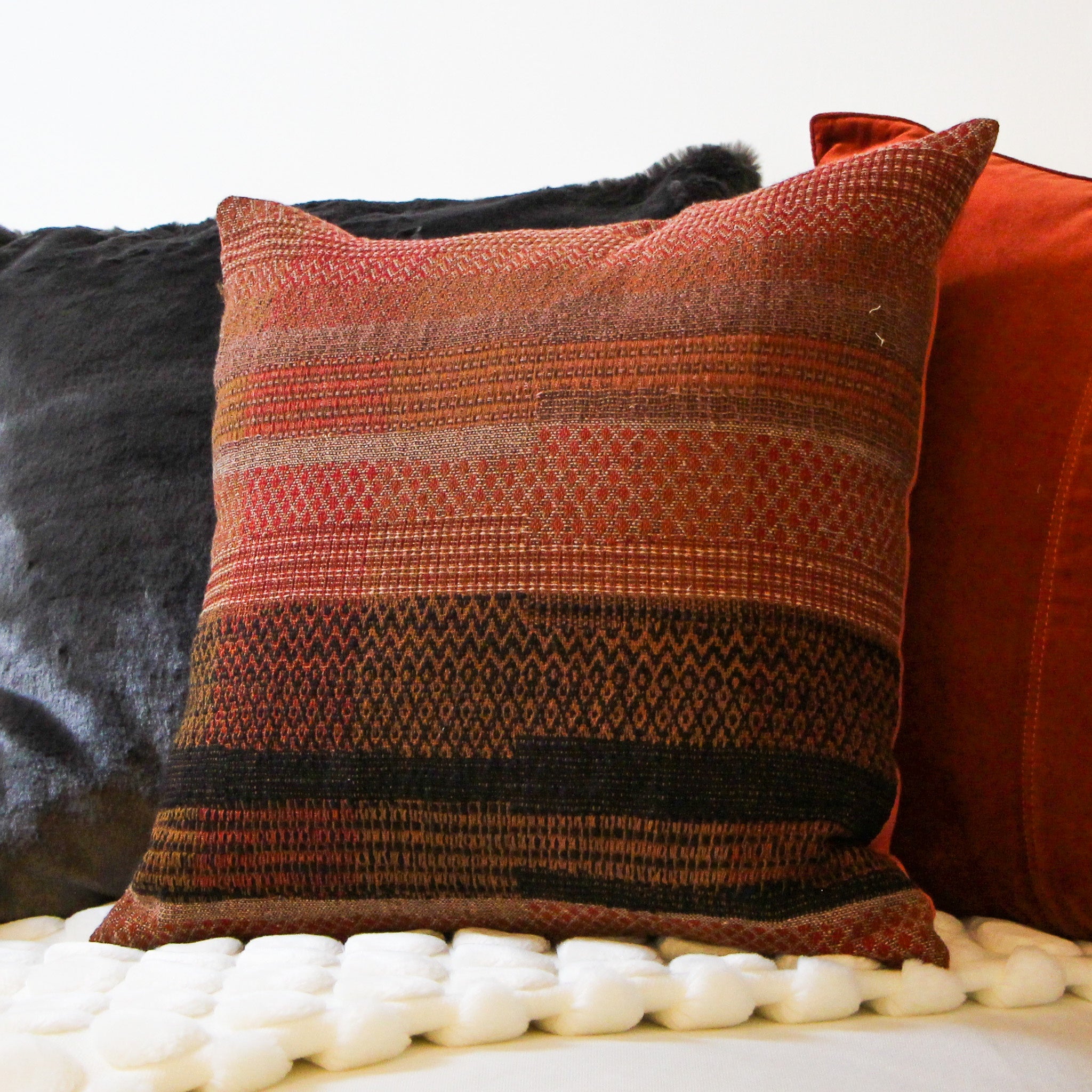 Handwoven wool and silk cushion, desert red and black stripe, 45 x 45 cm, India