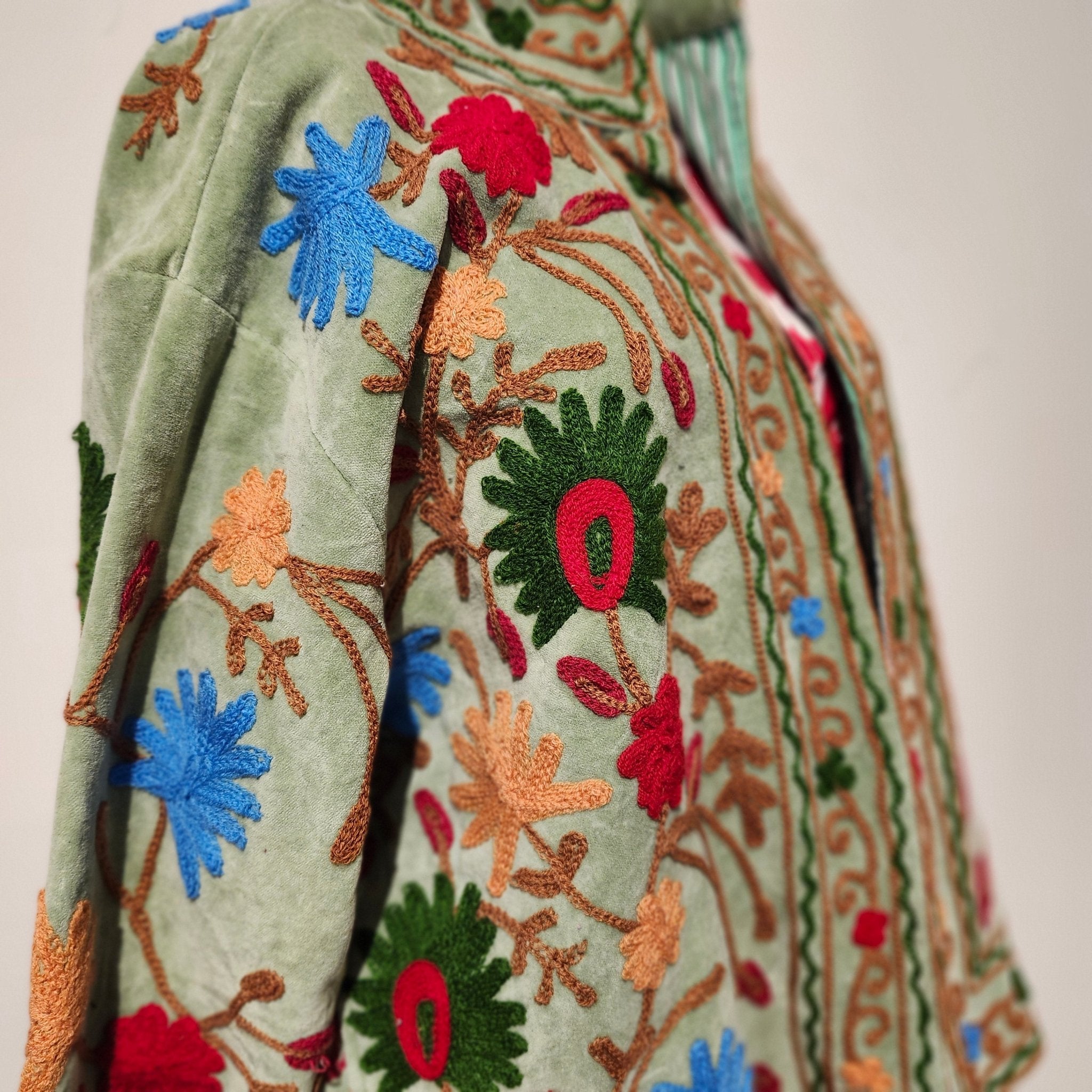 Mint suzani velvet jacket, hand-worked stitching, styled