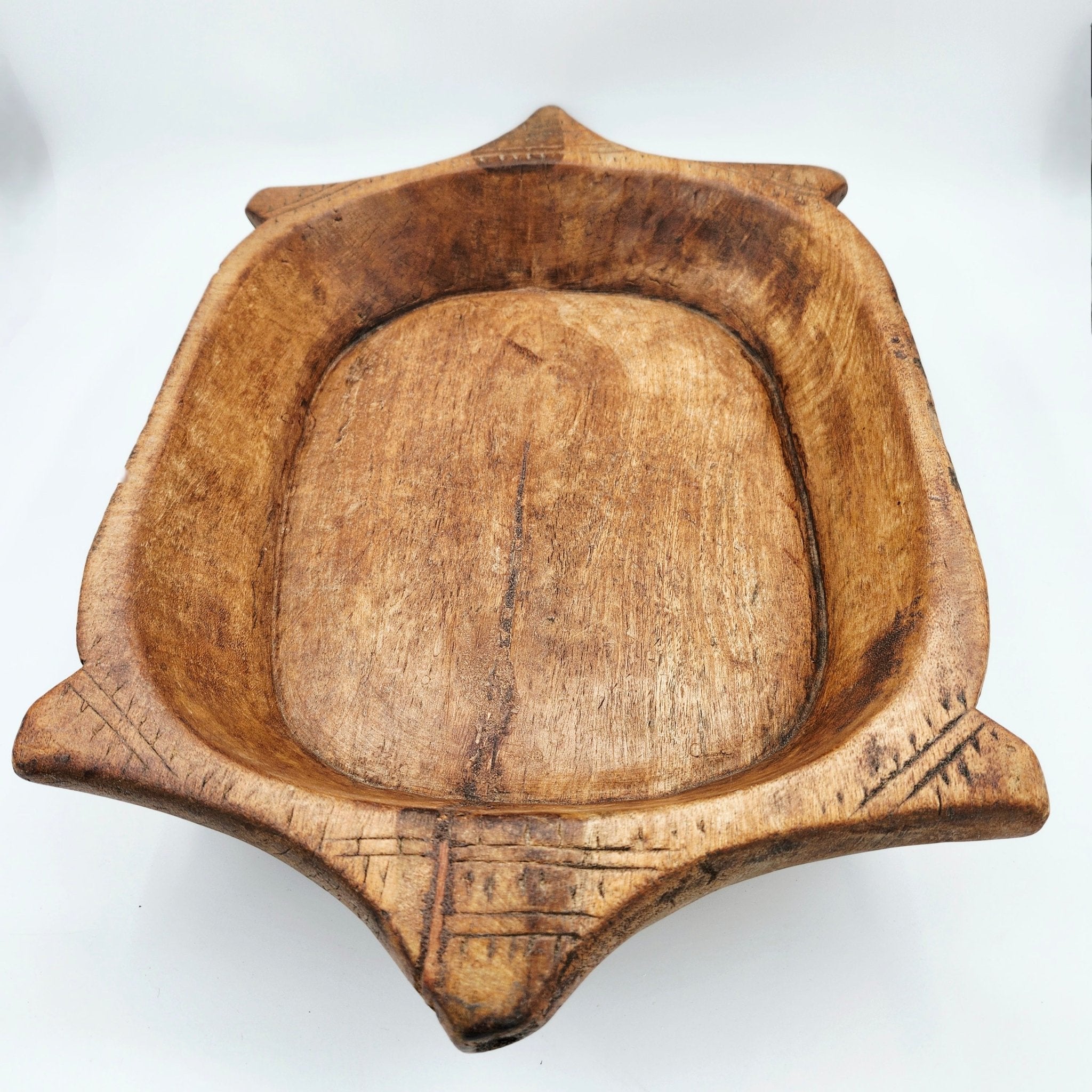 Vintage teak serving platter, natural wood grain, detail
