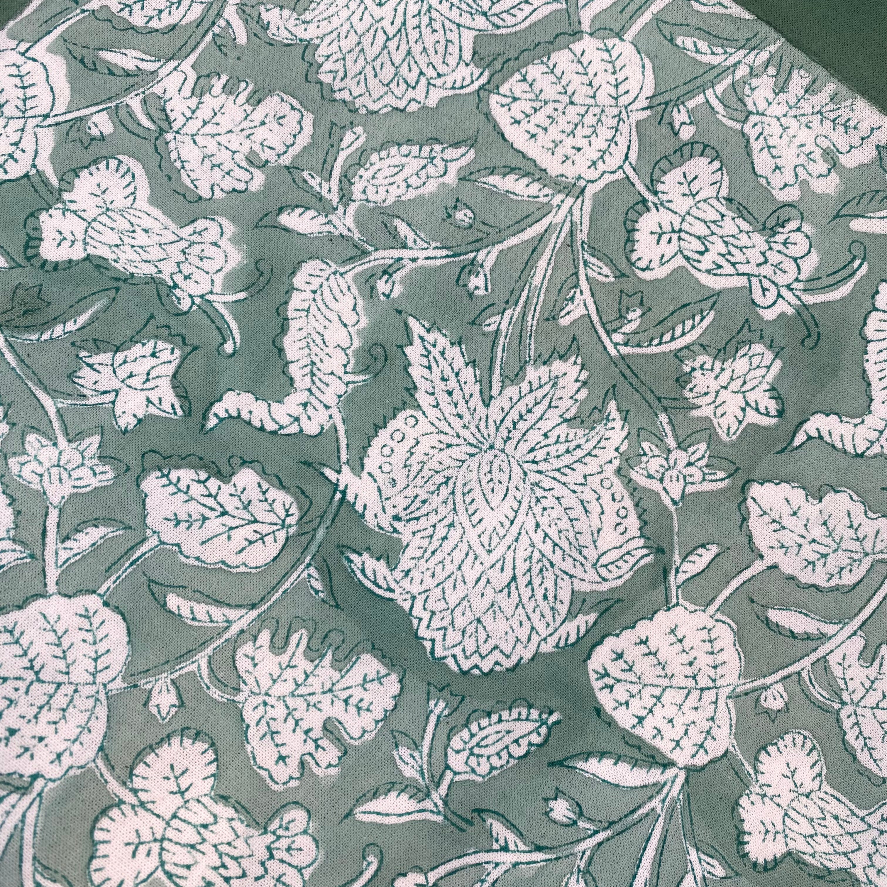 Classic teal floral block-print cotton tablecloth on white
