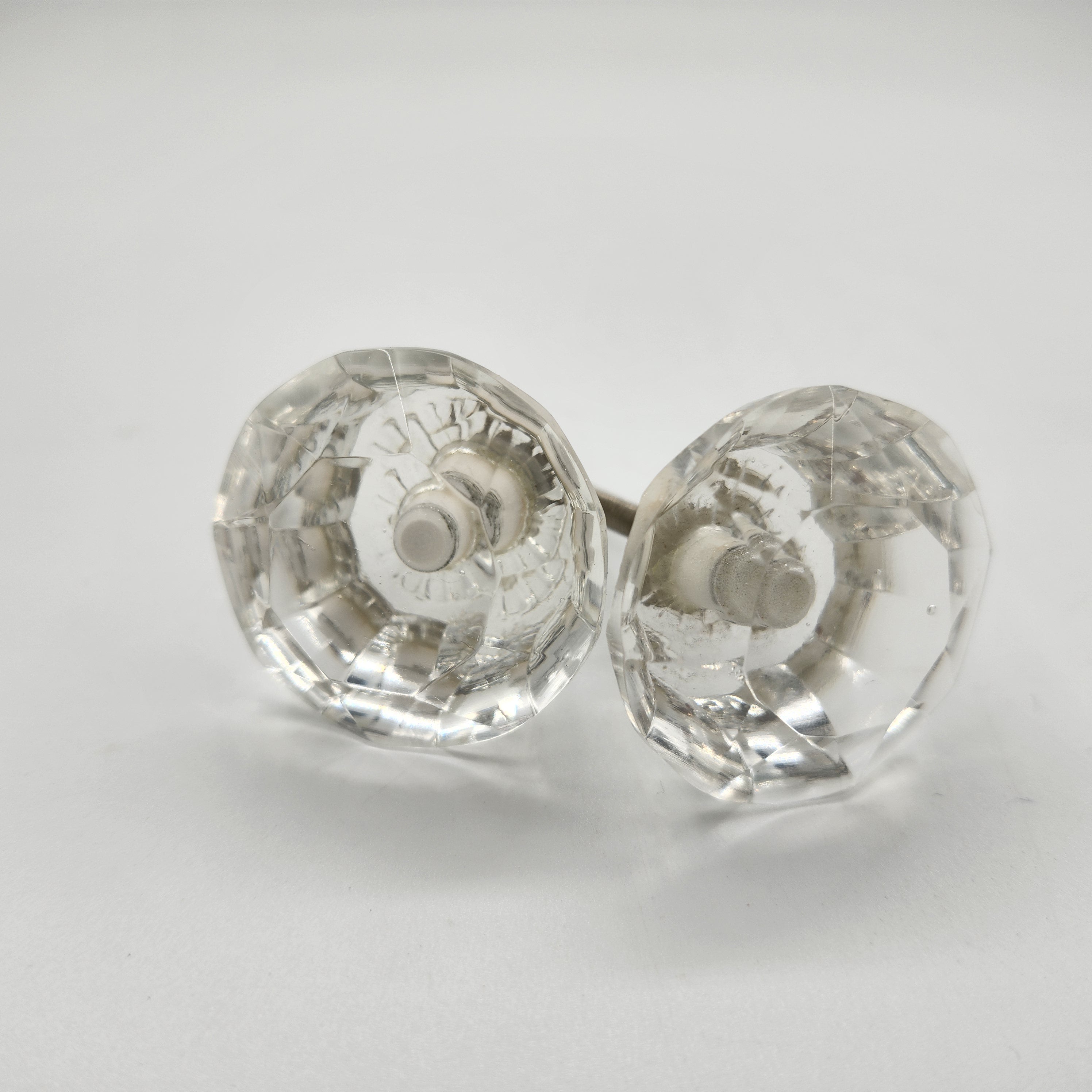 Set of 2 small faceted glass door knobs