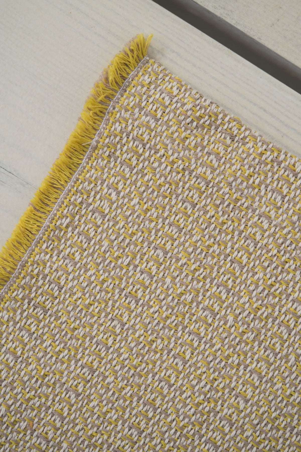 Recycled cotton placemat in yellow and beige, 52 x 34 cm