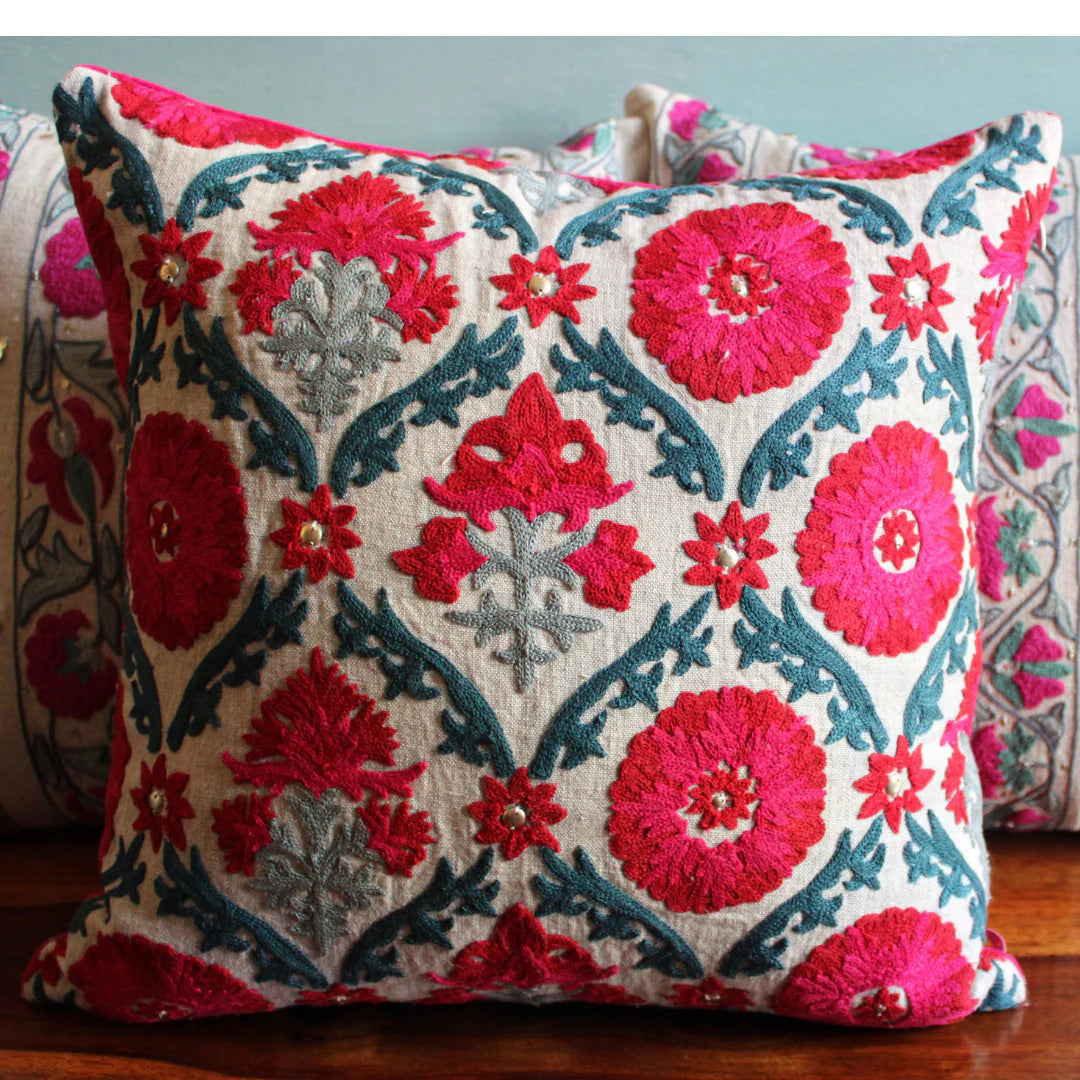 Suzani Niksaar linen cushion, red and pink needlework