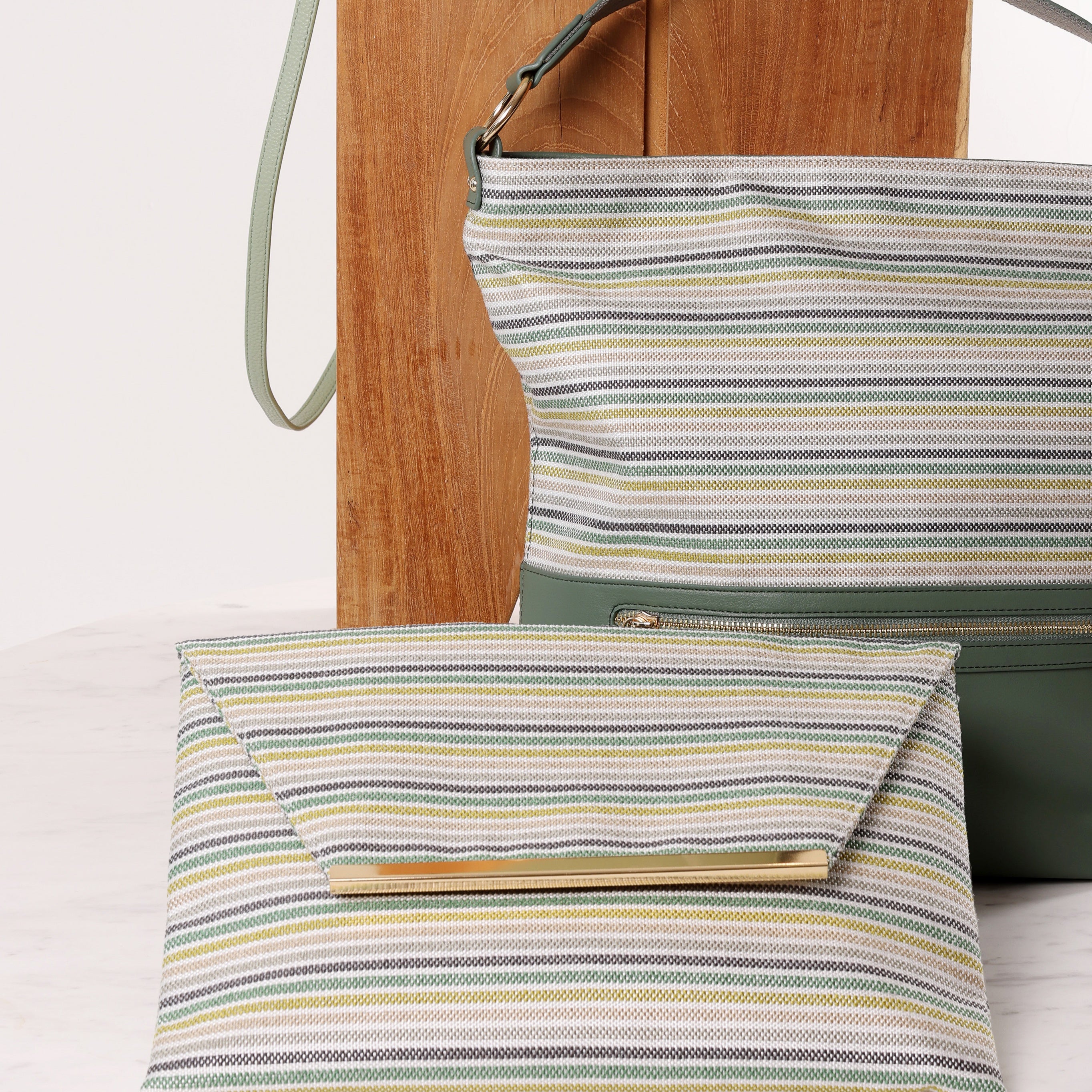 Ceannis envelope bag in green stripes, sleek envelope design with magnet closure