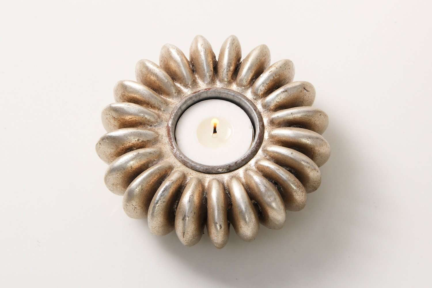 Seed tea light holder in antique silver, resin cast from a sandbox seed pod, Forwood Design