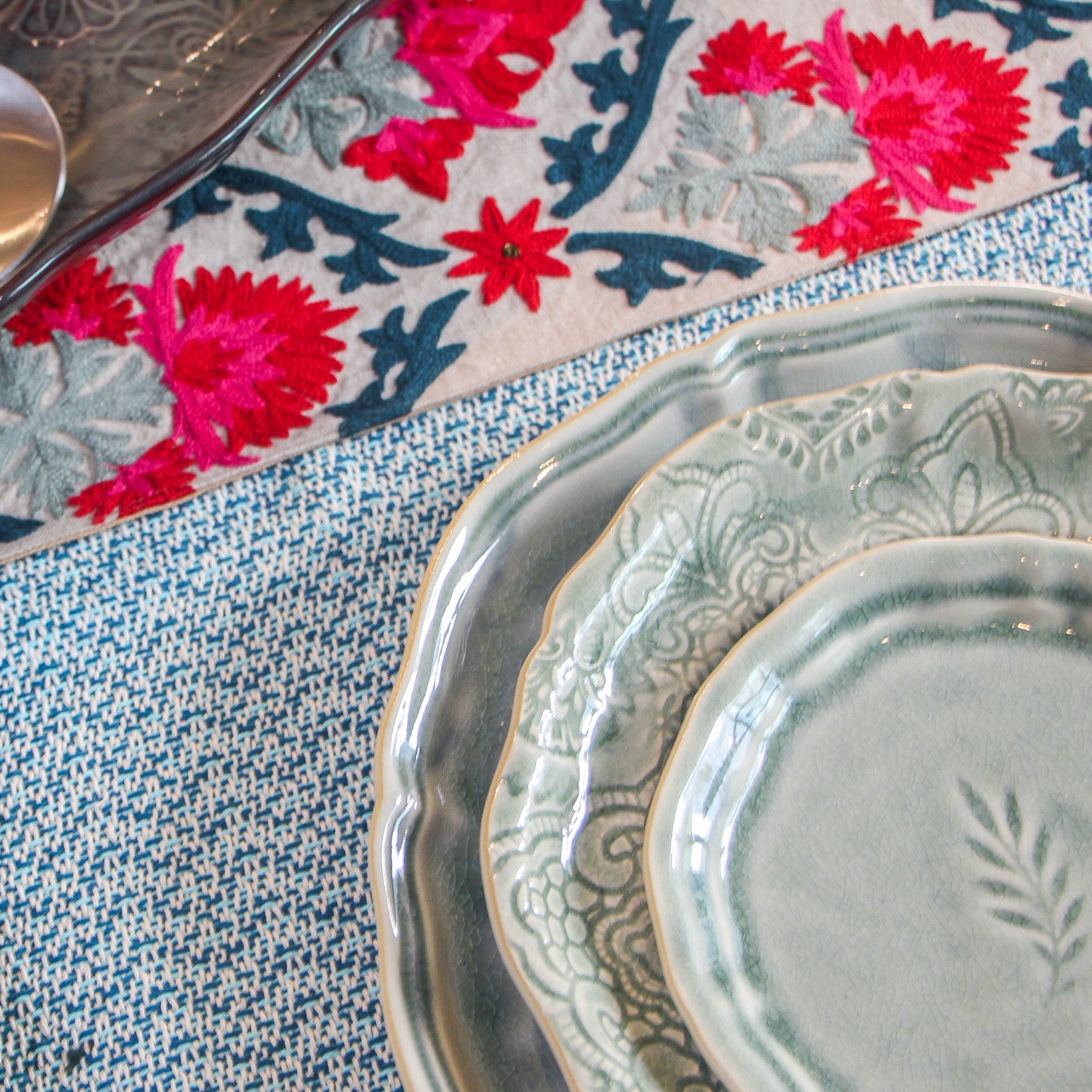 Suzani Niksaar linen runner styled on a dining table