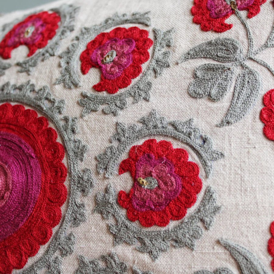 Suzani Red Butah rectangular linen cushion, close view of embroidery