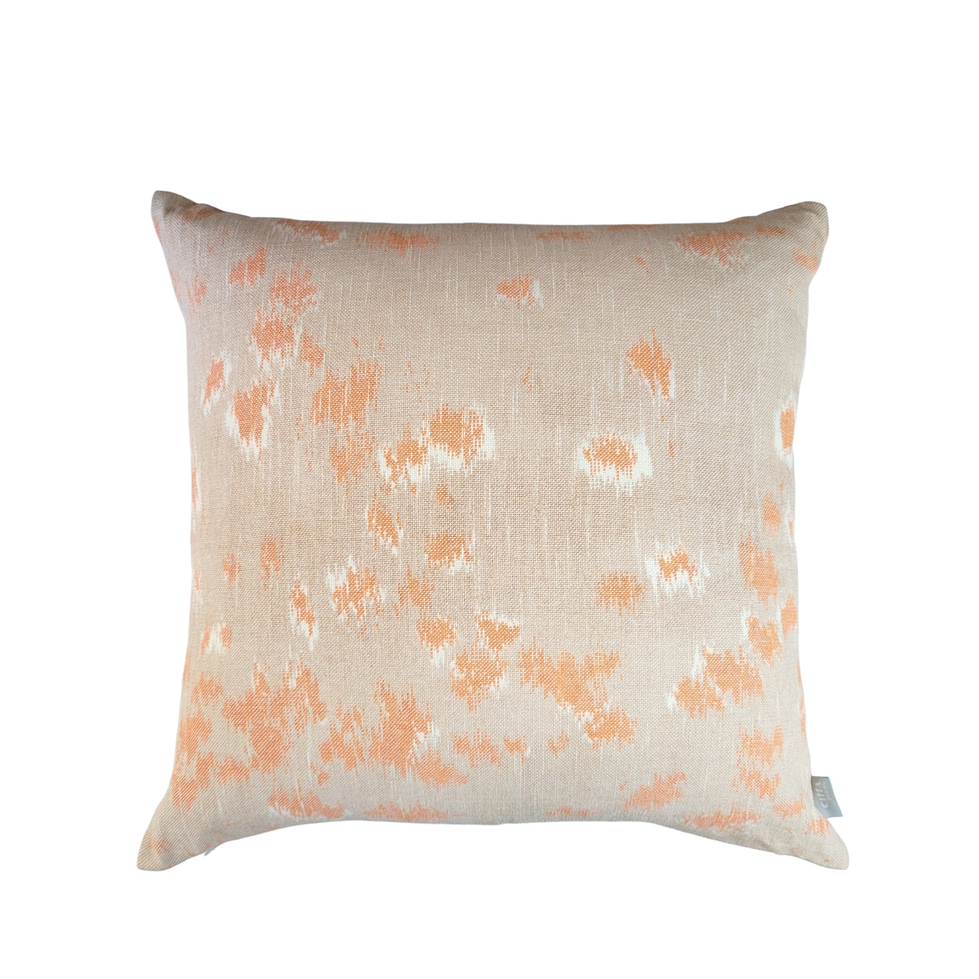 Abstract ikat cushion cover in persimmon, white and natural cotton, 50 cm square