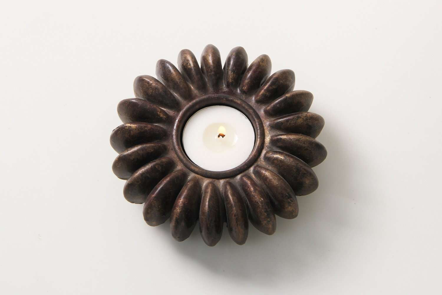 Seed tea light holder in bronze, resin cast from a sandbox seed pod, Forwood Design