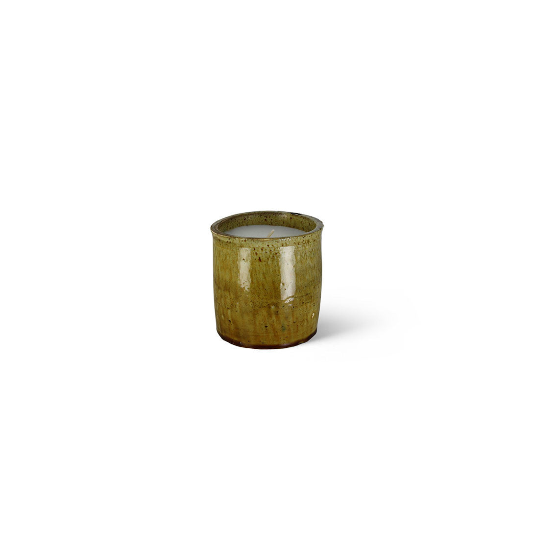 Tamegroute Orange Blossom candle, handcrafted brown pottery, styled view