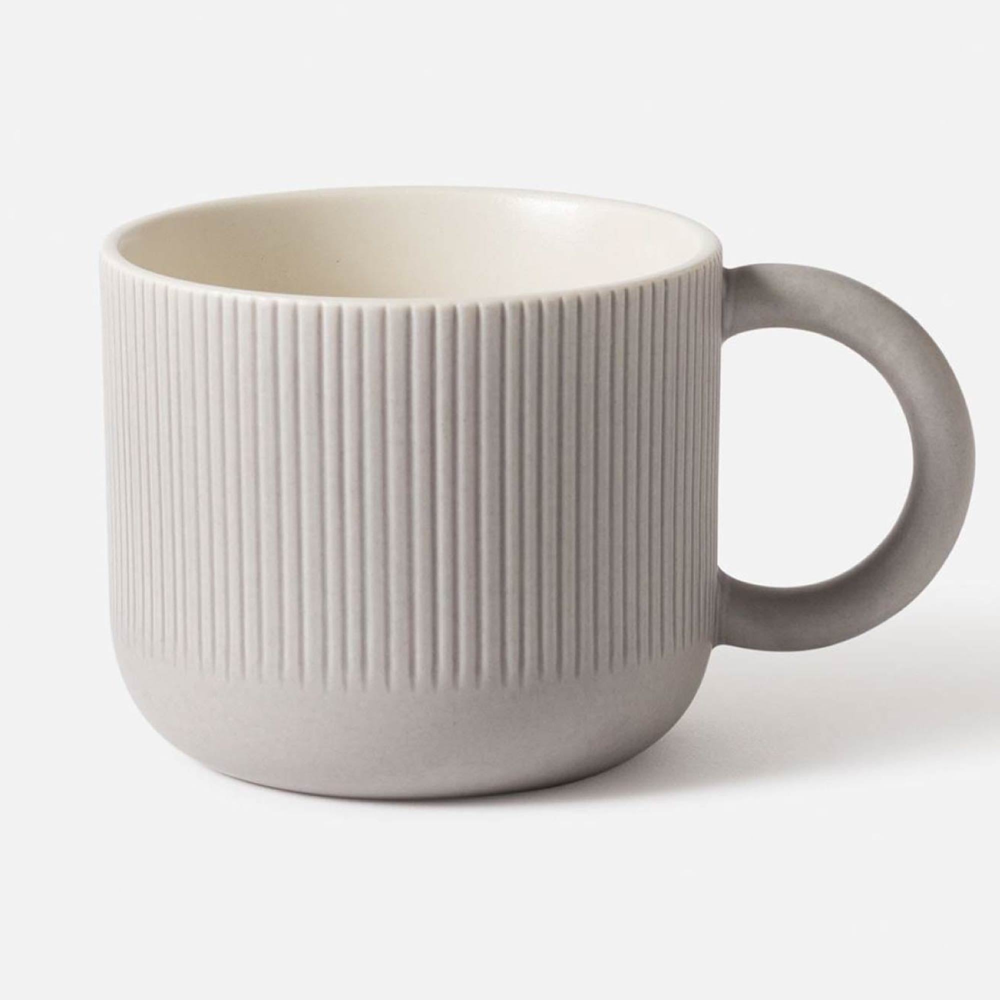 Cafe stoneware mug in grey with linear detailing