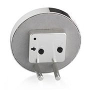 Round chiffon and silver enamel alarm clock, grey velvet backing, side view