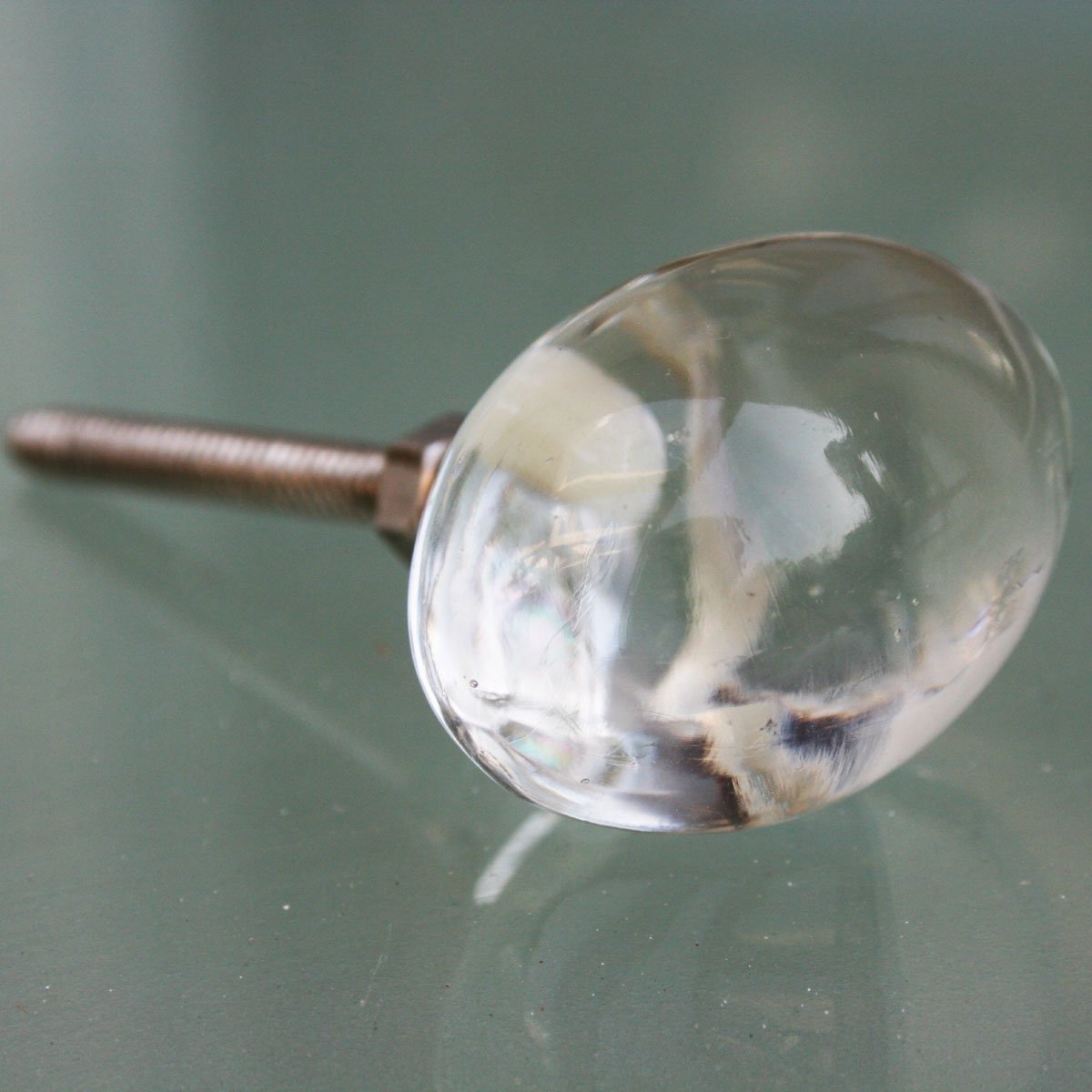 Set of 2 egg-shaped glass door knobs, 40 mm