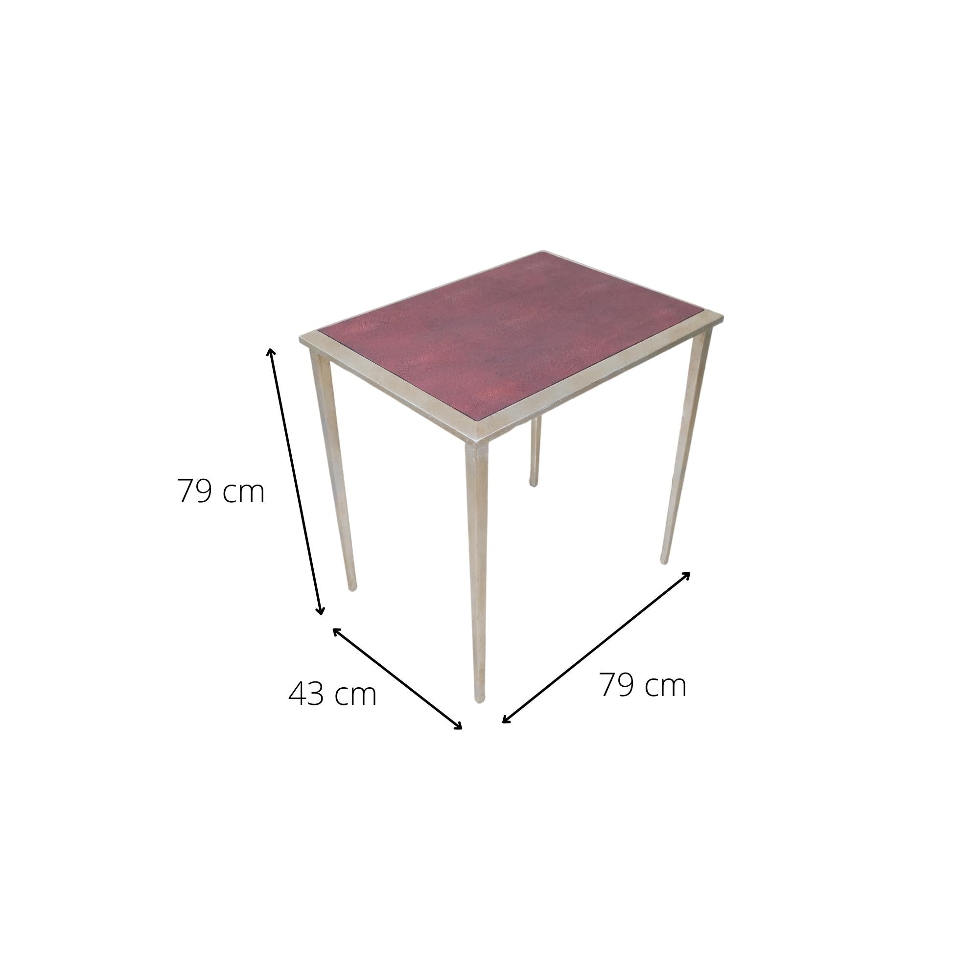 Red faux shagreen side table, powder coated steel frame, lifestyle shot