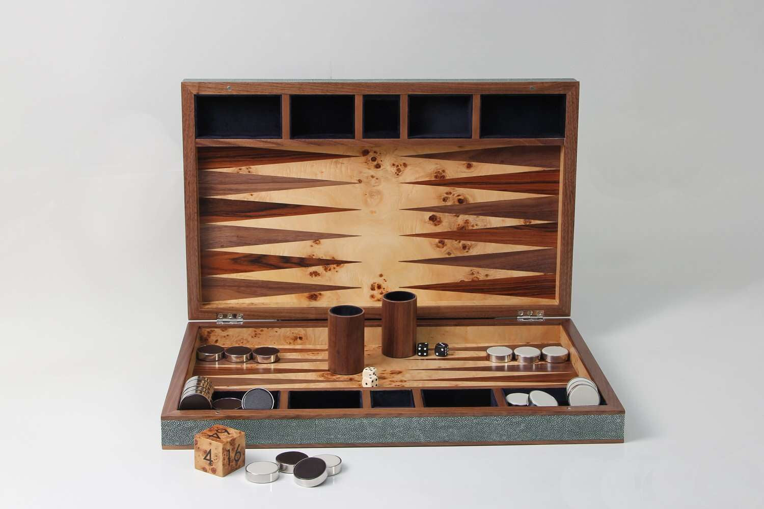 Lincoln green faux shagreen backgammon board, open showing midnight blue velvet storage and pieces