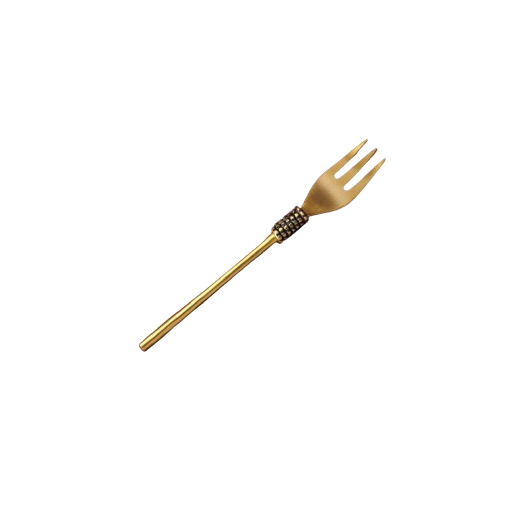 Brass dessert fork with gold finish, handcrafted, detail view