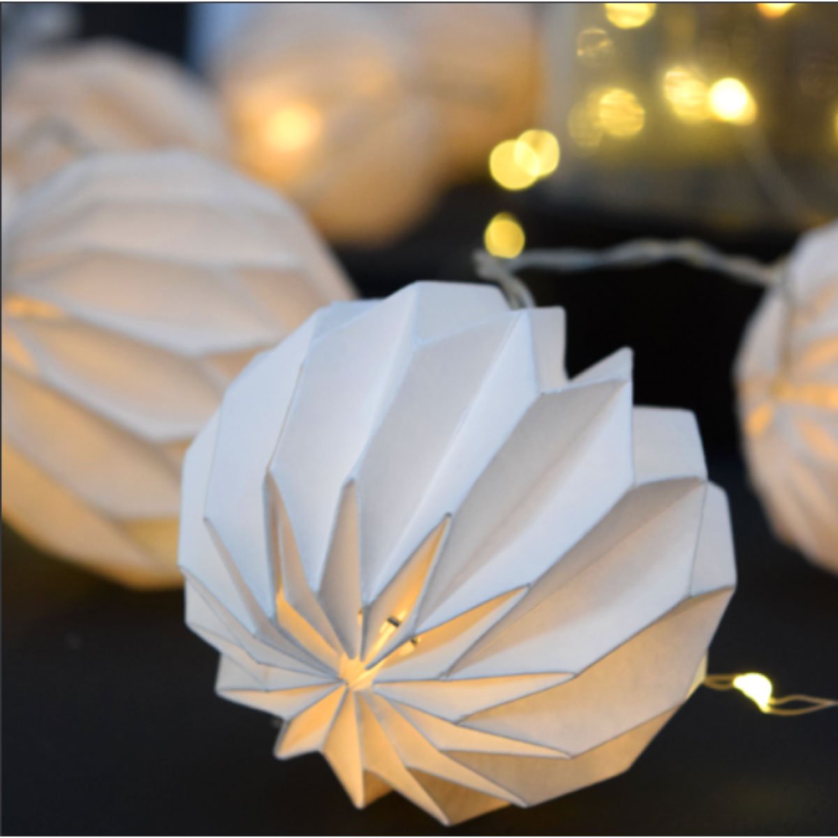 Paper light garland of ten origami baubles with LED lights by Citta, 2 m long