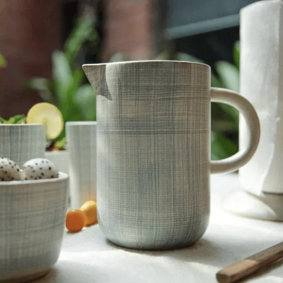 Saan ceramic jug, hand-painted blue chequered weave on eggshell white, 1000ml