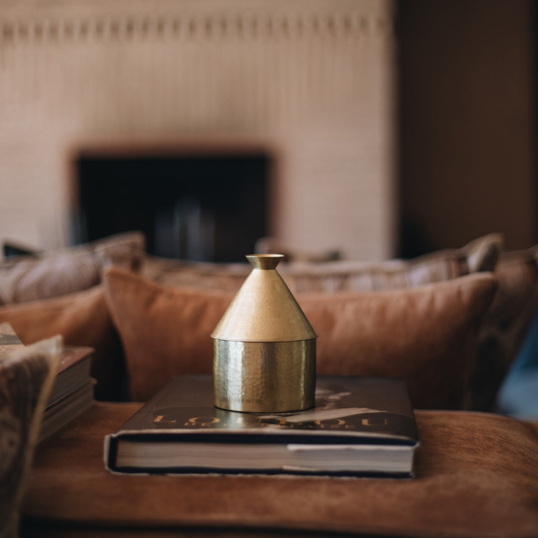 Tajine Maillechort candle in hammered brass tajine holder, pine, spice and mandarin scent