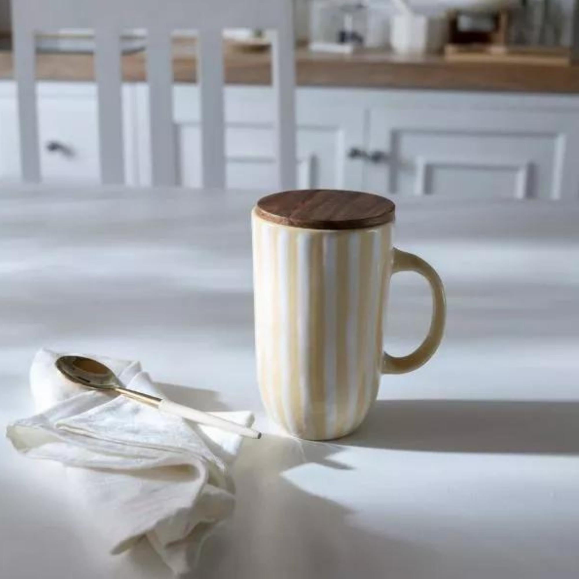 Tall lemon ceramic mug with a wooden lid