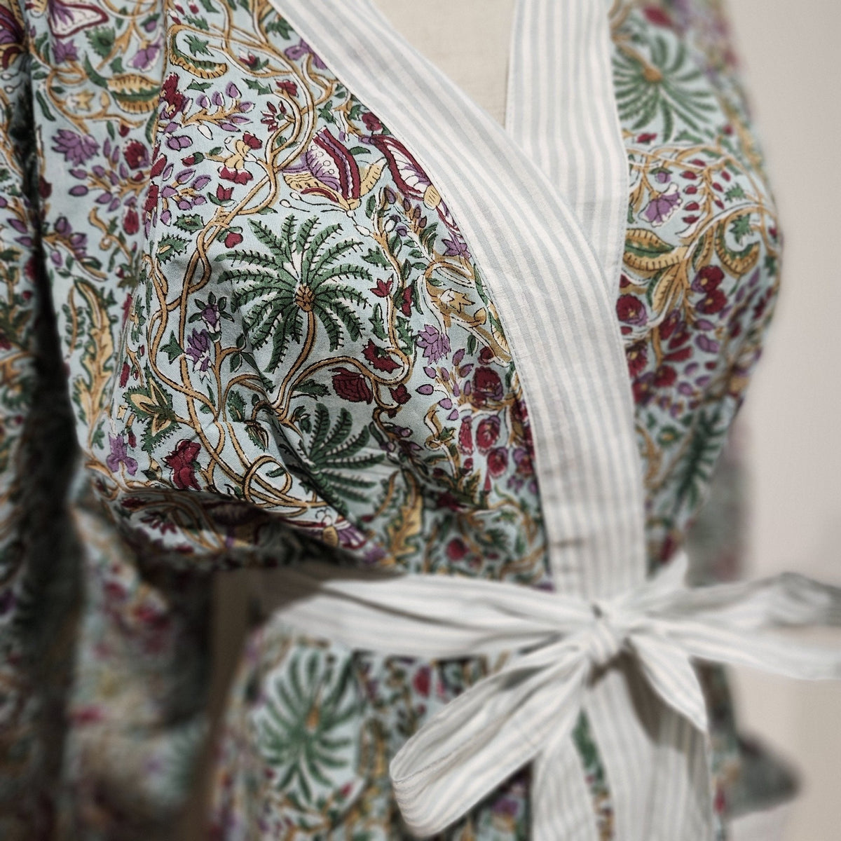 Aqua Rainforest block print cotton robe with contrast trim, matching belt and two pockets, in one size