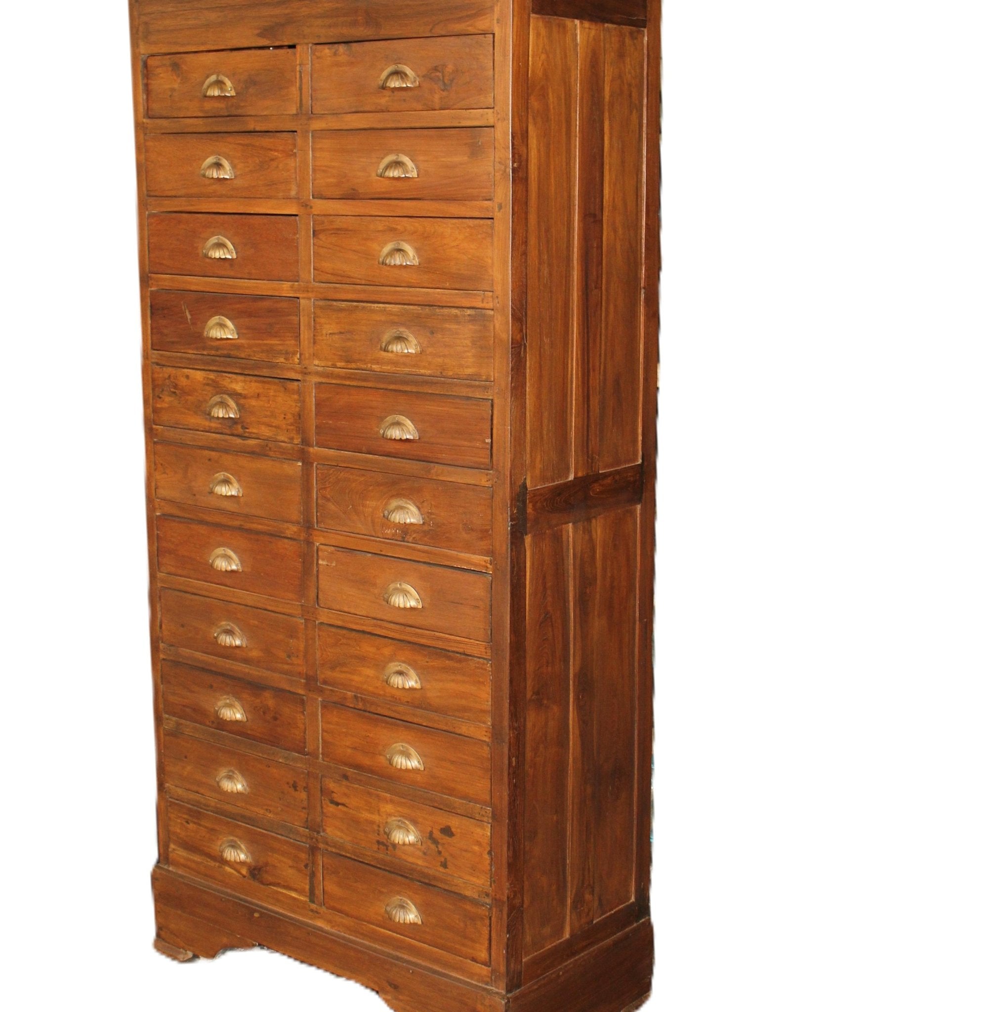 Teak chest of drawers with brass handles and a natural wax finish, standing 180 cm high, made in India