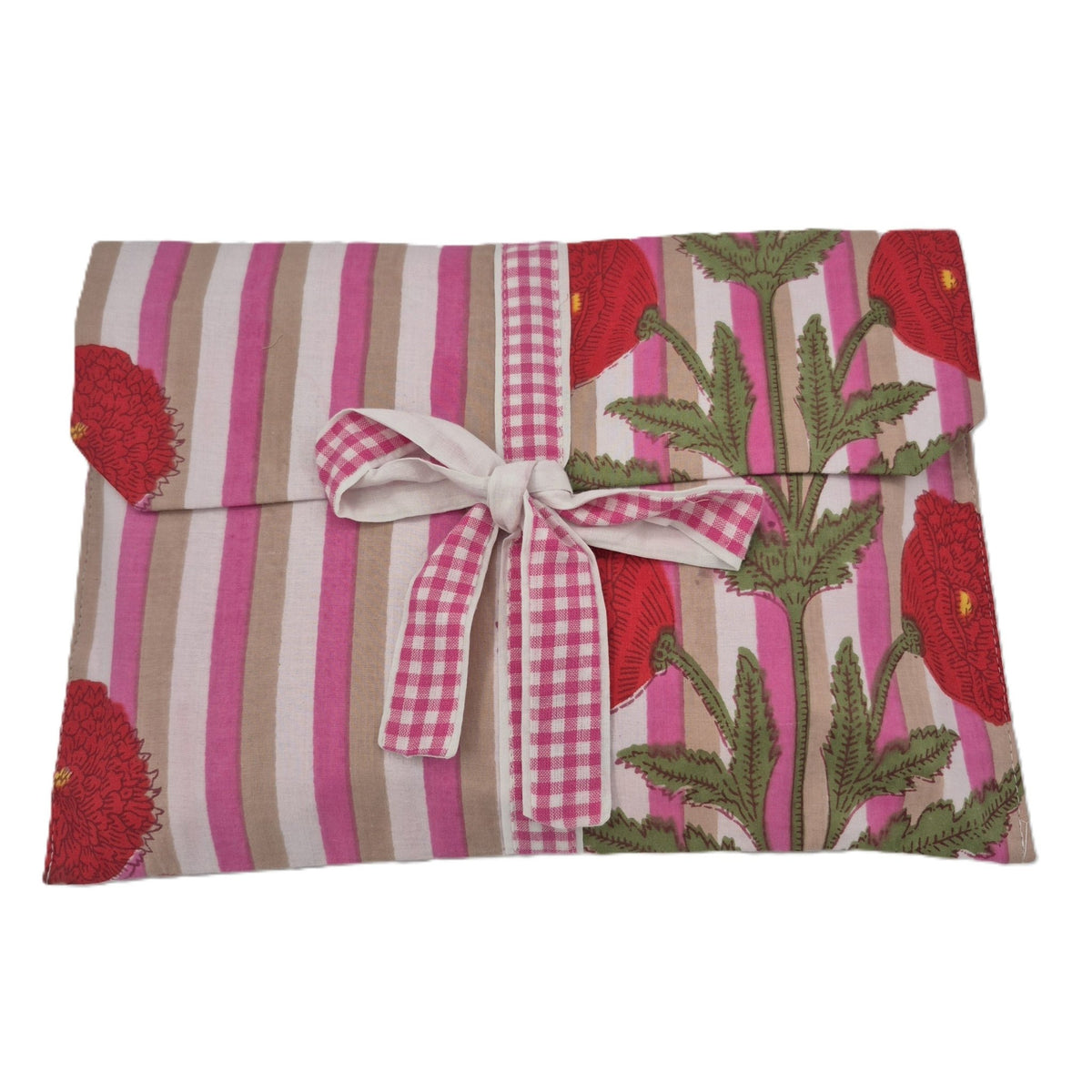 Styled view of the poppy print pyjamas, supplied in a matching envelope bag tied with a ribbon.