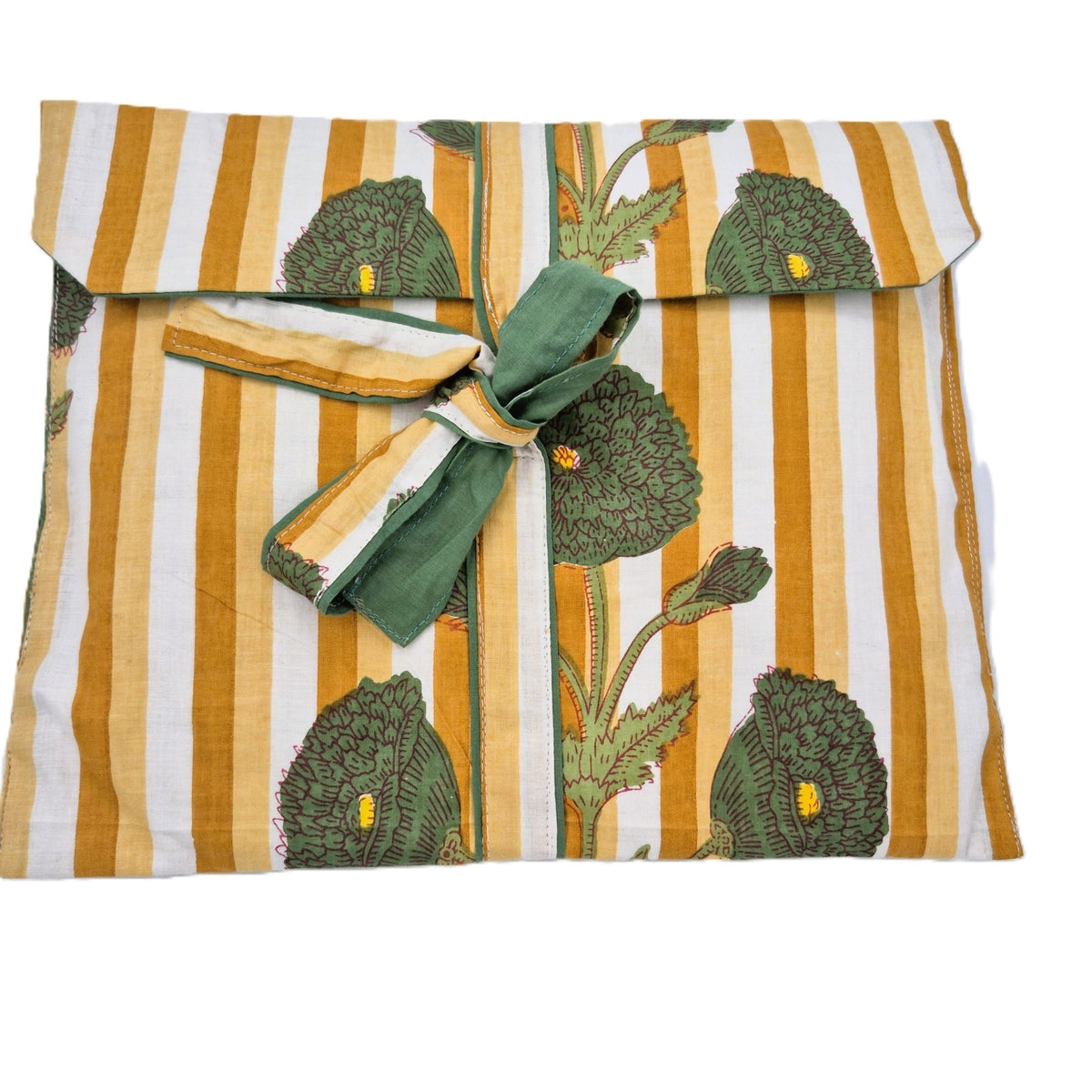 Detail of the poppy block print on the long pyjama set, with loose bottoms and a drawstring waist.