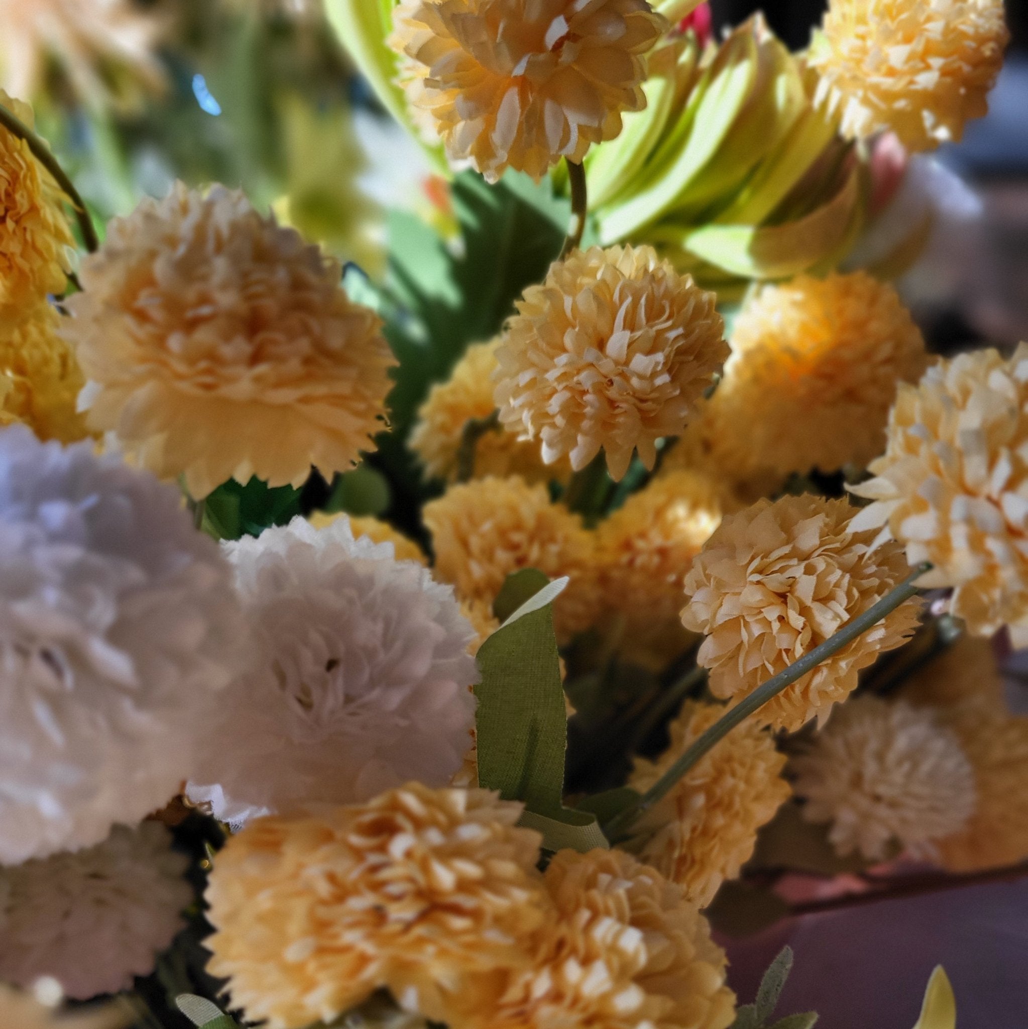 Lifelike small artificial bubble dahlias in yellow and white