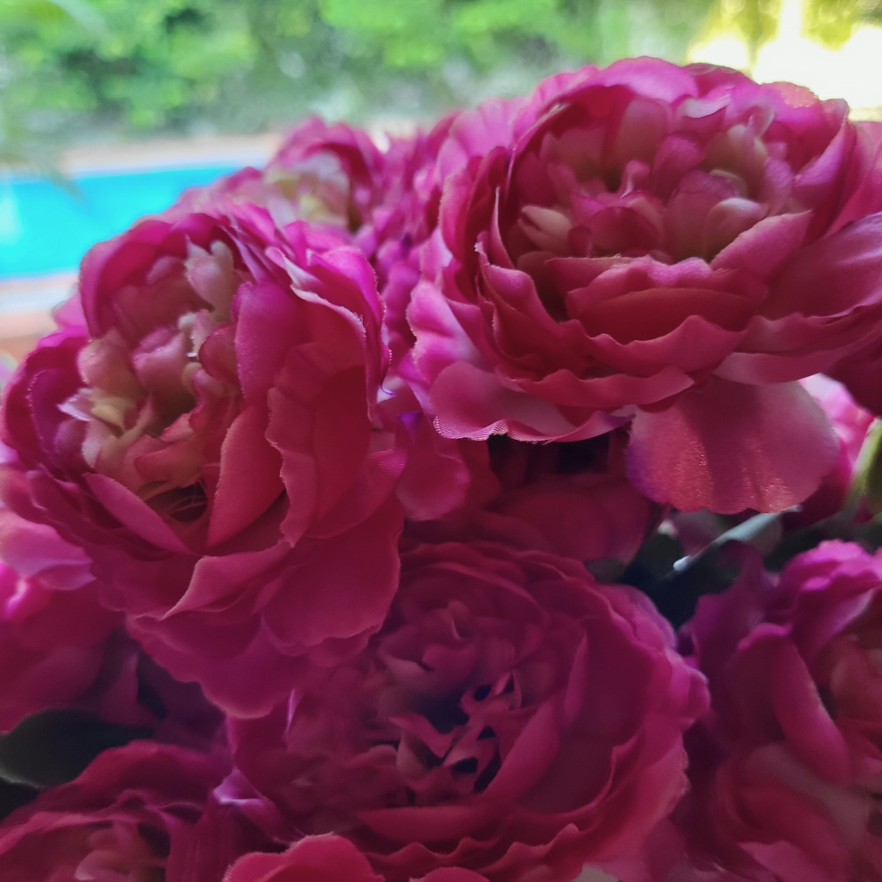 Lifelike artificial ranunculus stem with two open flowers and a bud