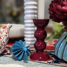Cherry lacquer bobbin candlestick by Addison Ross