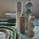 Group of bobbin salt and pepper mills in assorted lacquers