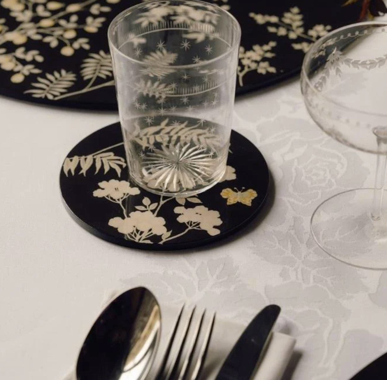 Set of black lacquer Chinoiserie coasters, gift boxed