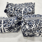 Floral blue block-print wash bag with a tassel zip