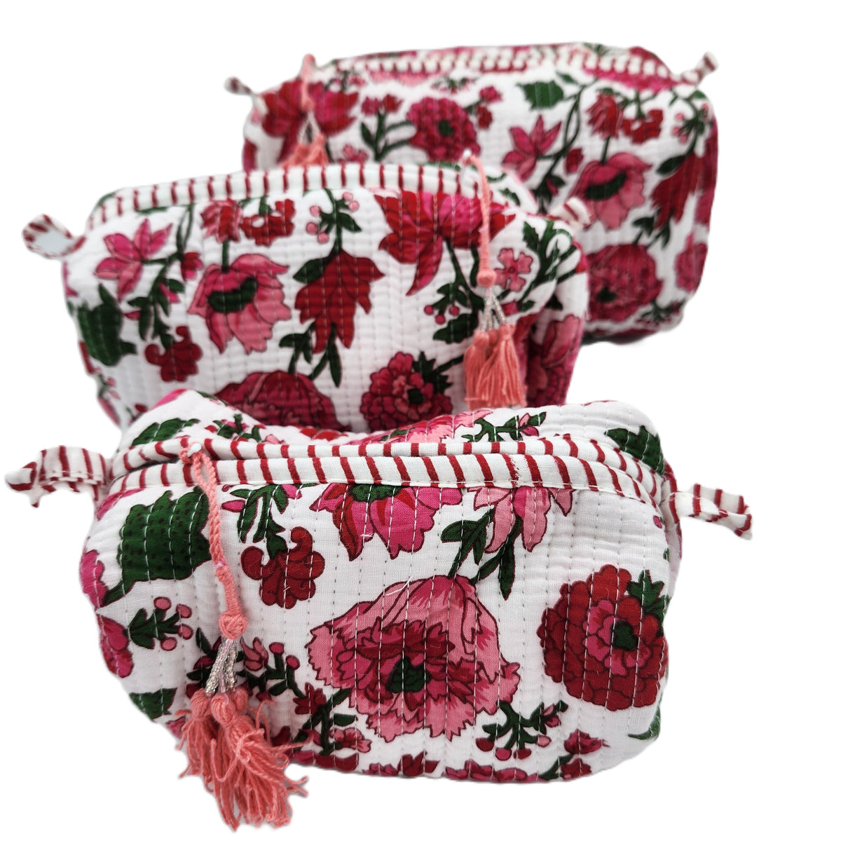 Handmade block print wash bag in the Ruby design, with a spacious lined interior and zip closure.