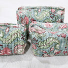 Hibiscus block-print wash bag with a tassel zip
