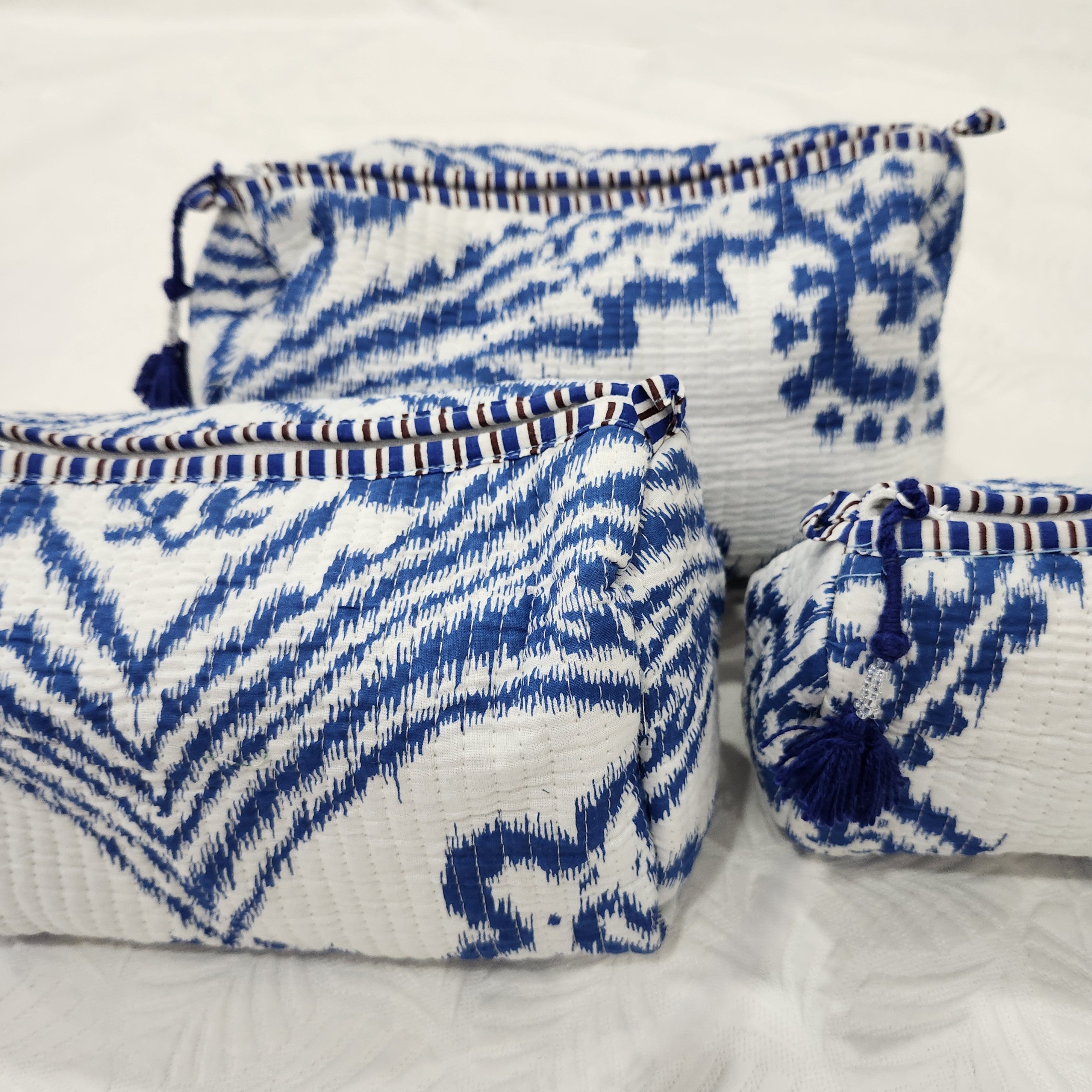 Ikat block-print wash bag in blue and white